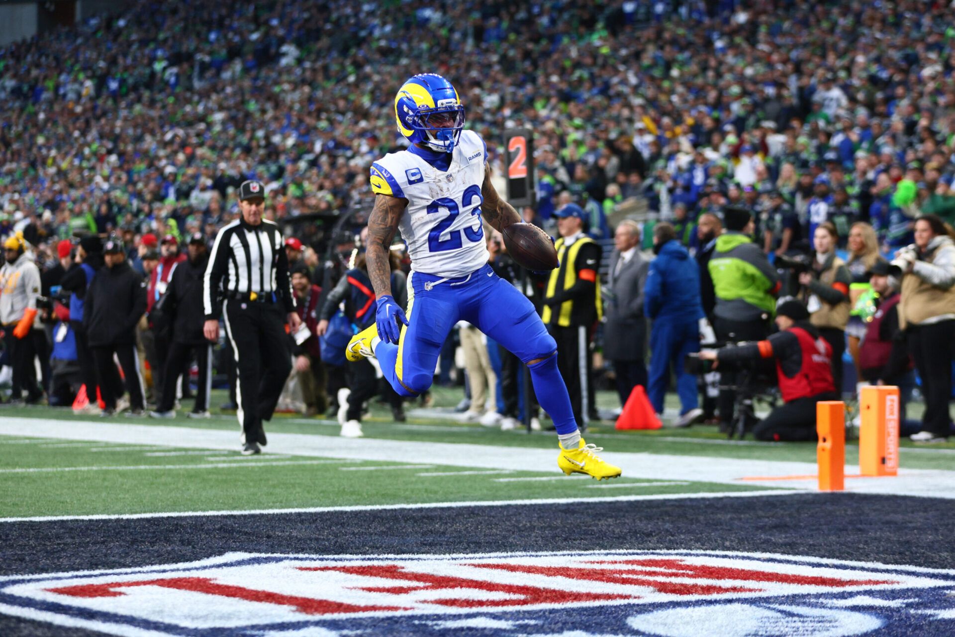 Los Angeles Rams running back Kyren Williams (23) runs to score a touchdown against the Seattle Seahawks during the first half in the 2026 NFC Championship Game at Lumen Field.