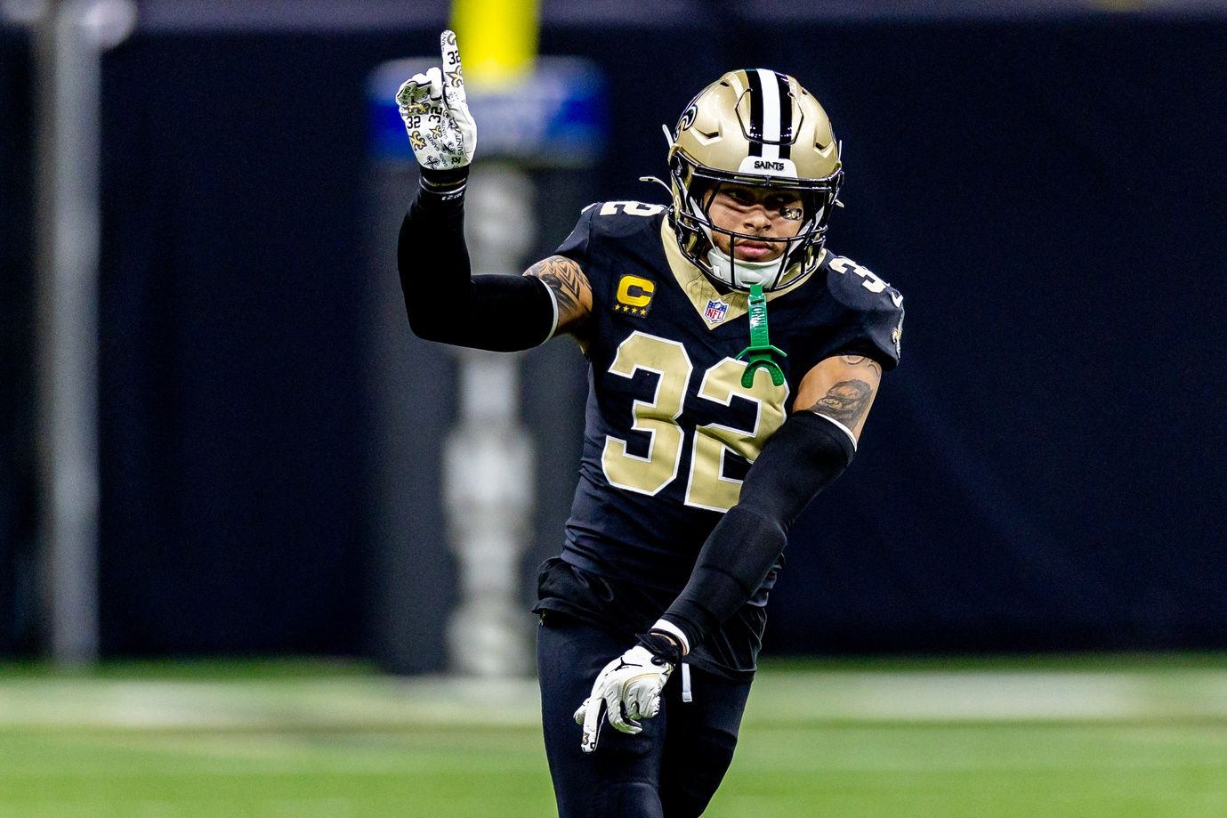 New Orleans Saints safety Tyrann Mathieu (32) reacts to a play against the Las Vegas Raiders during the second half at Caesars Superdome.