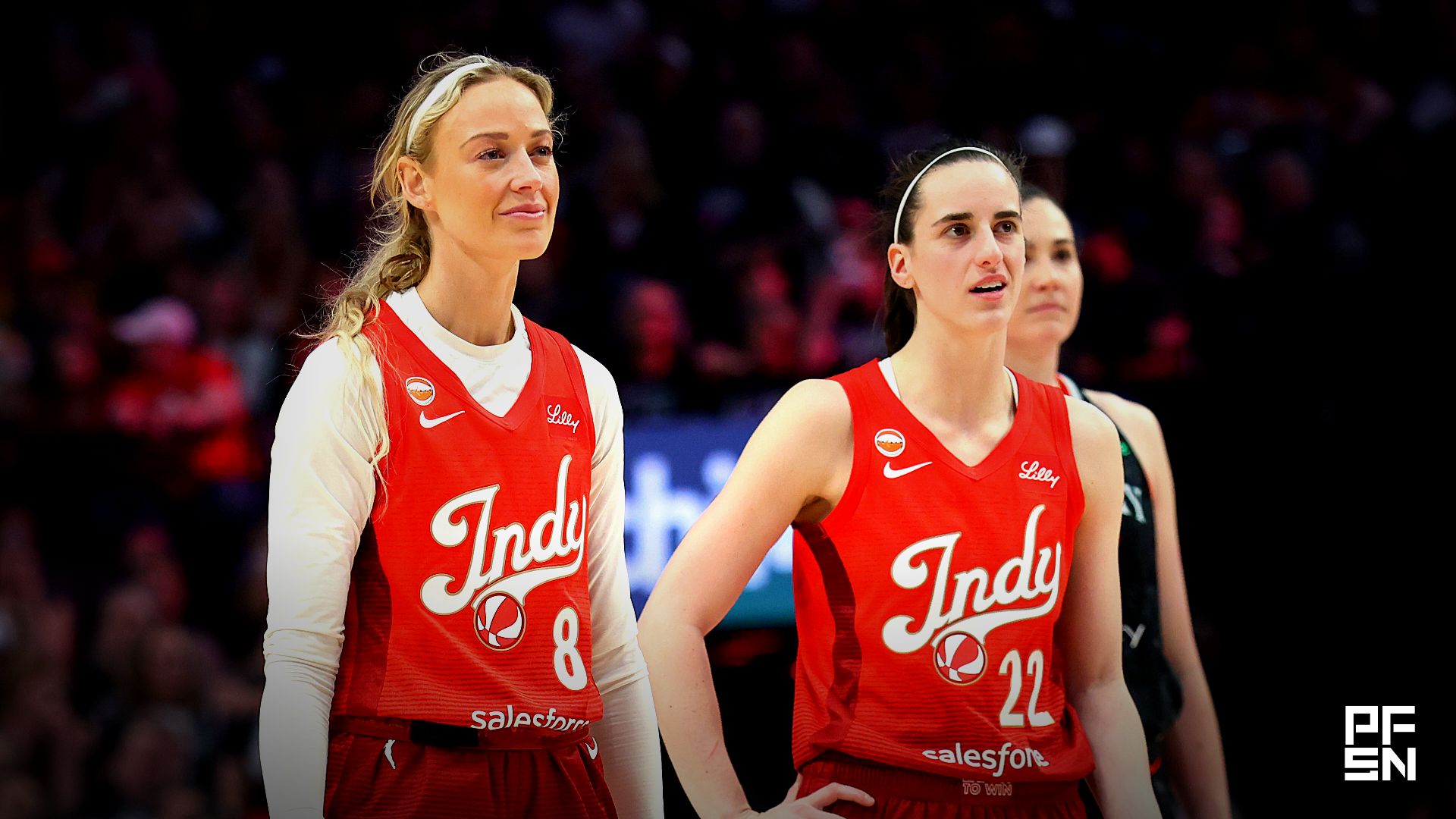 Indiana Fever guard Sophie Cunningham (8) and guard Caitlin Clark (22) stand next to each other during the second half against the Portland Fire at Moda Center.