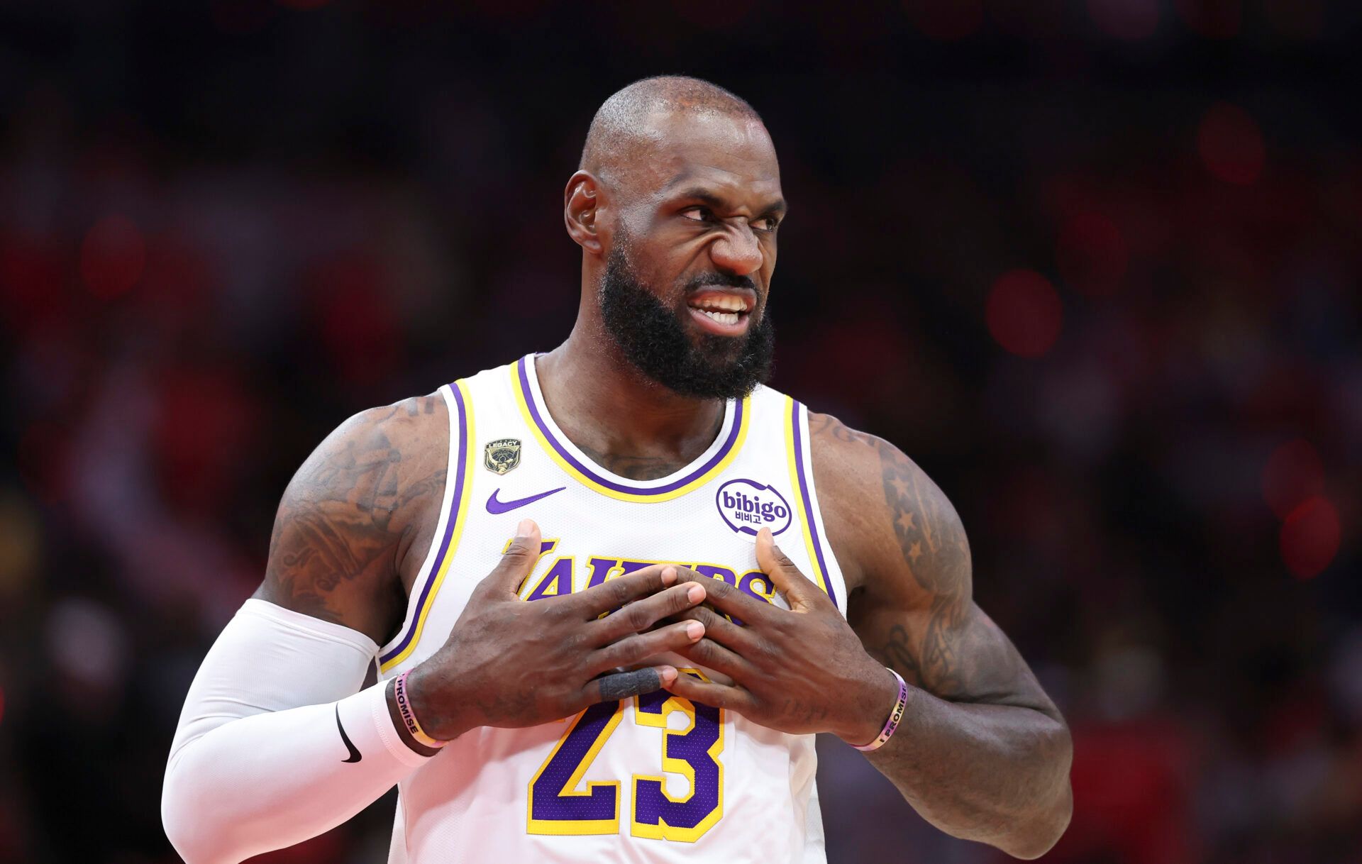 Los Angeles Lakers forward LeBron James (23) walks on the court before the start of the game against the Houston Rockets in game four of the first round of the 2026 NBA Playoffs at Toyota Center.