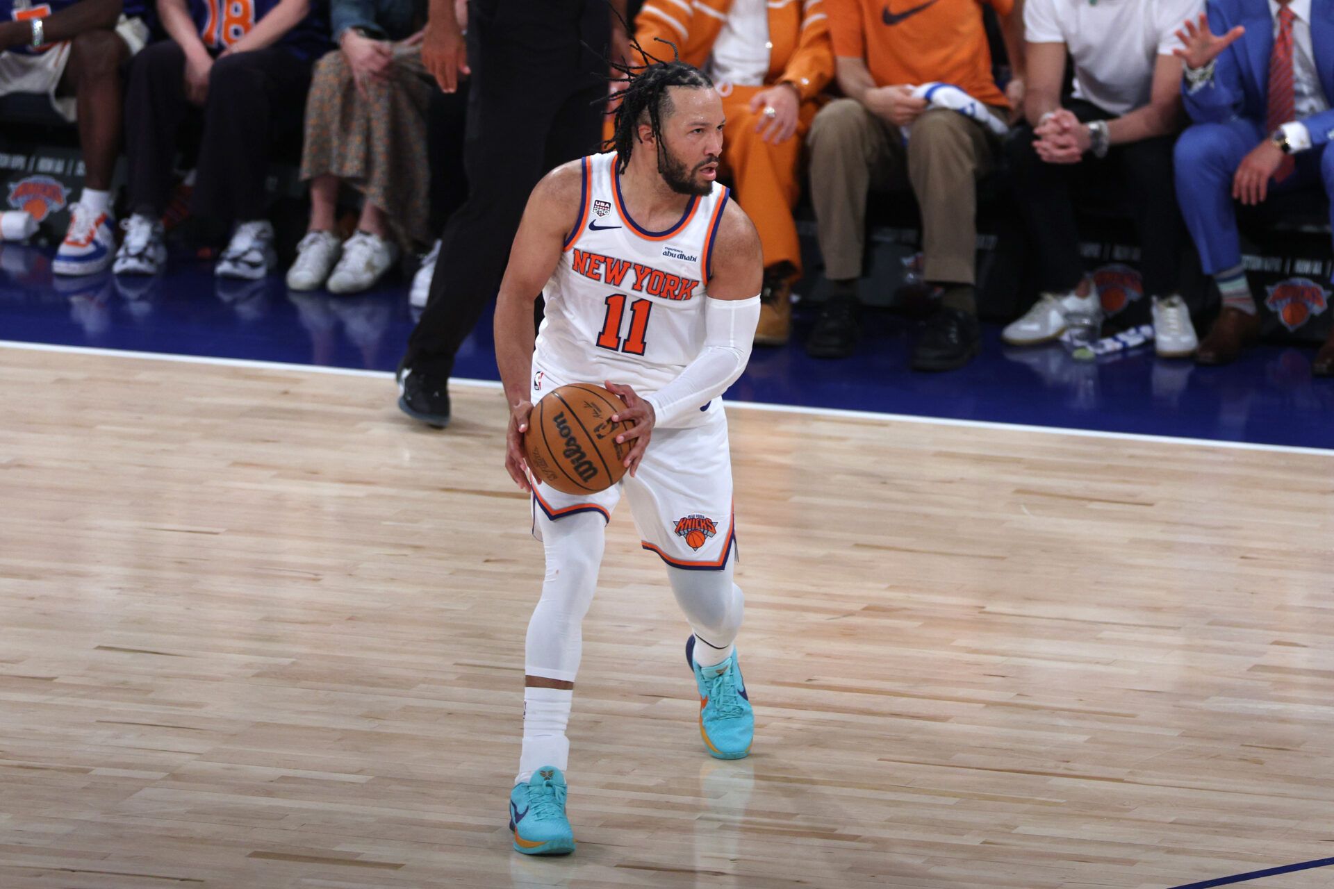 New York Knicks guard Jalen Brunson (11) controls the ball against the San Antonio Spurs in the second quarter during game three of the 2026 NBA Finals at Madison Square Garden.