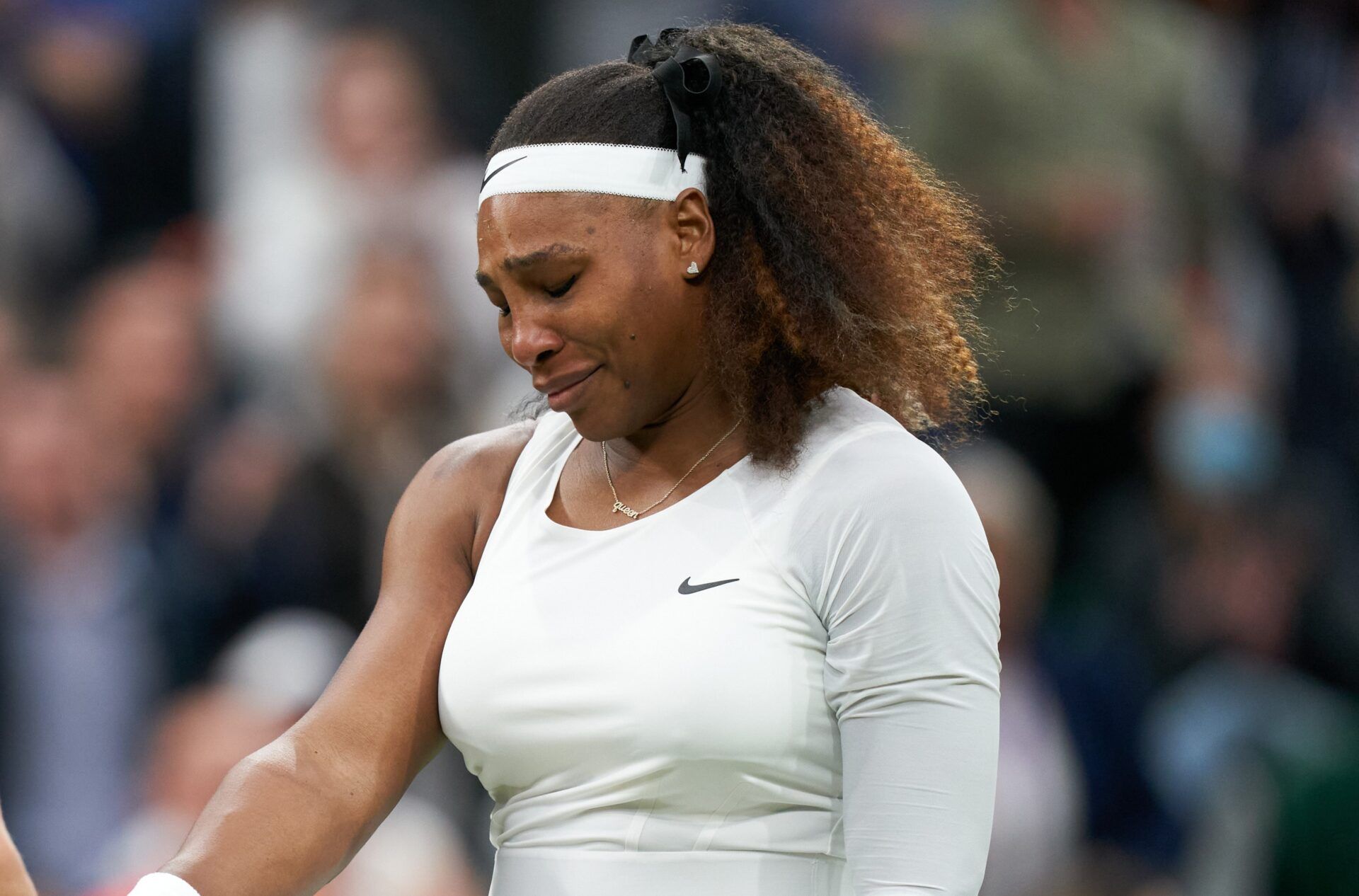 Serena Williams (USA) retires from the match against Aliaksandra Sasnovich (BLR) in first round ladies singles on centre court at All England Lawn Tennis and Croquet Club.