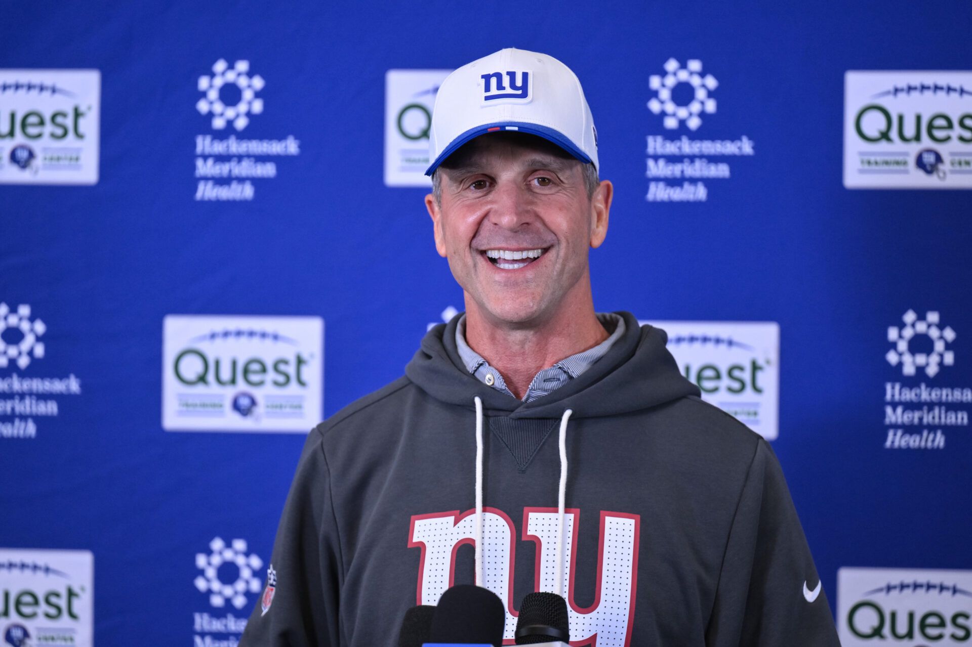 New York Giants head coach John Harbaugh speaks at a press conference during organized team activities at Quest Diagnostics Training Center.