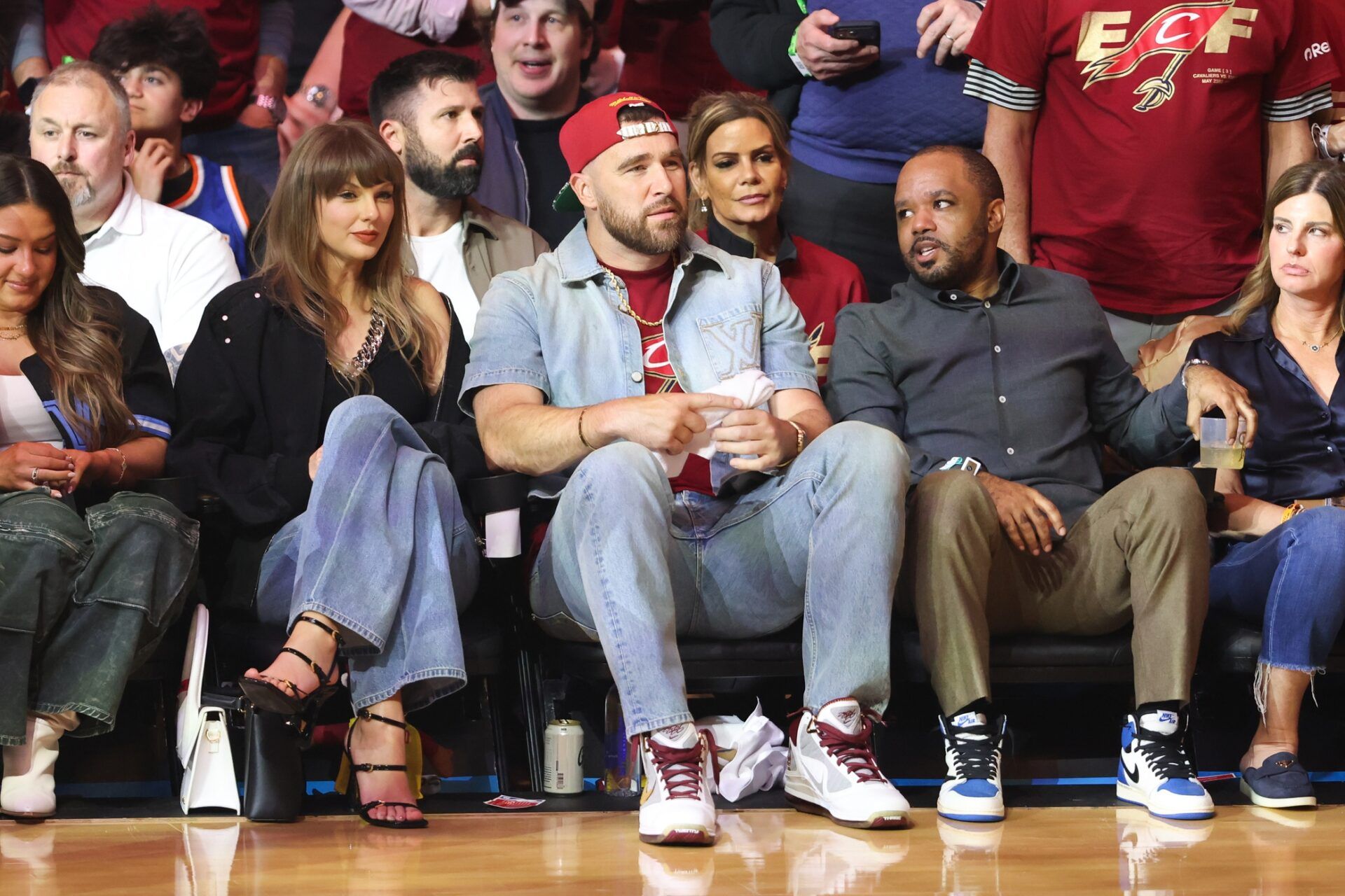 Taylor Swift and Travis Kelce look on during game three of the eastern conference finals for the 2026 NBA playoffs between the New York Knicks and Cleveland Cavaliers at Rocket Arena.
