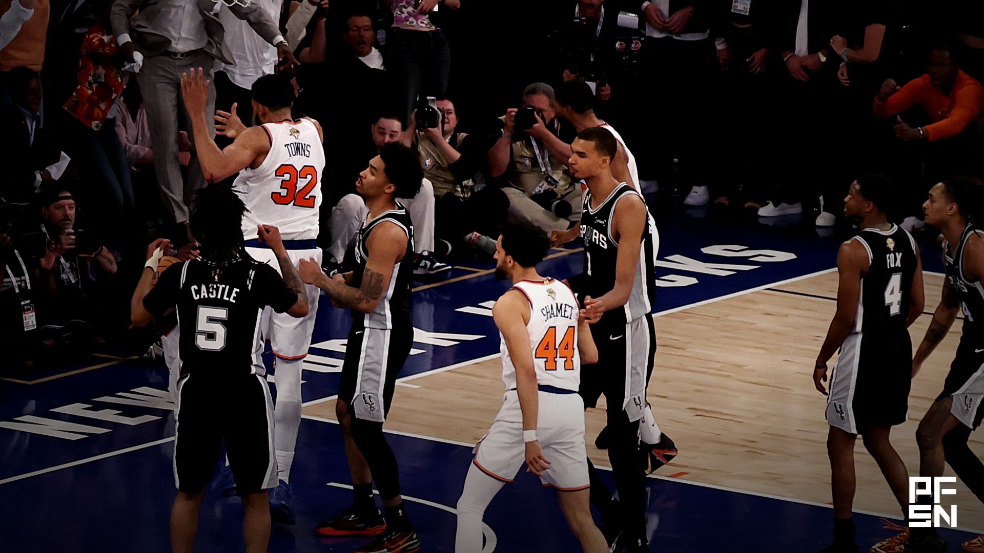 Fans and New York Knicks players erupt after a go-ahead tip in by Knicks forward Og Anunoby (8) against the San Antonio Spurs in the final second of the fourth quarter during game four of the 2026 NBA Finals at Madison Square Garden.