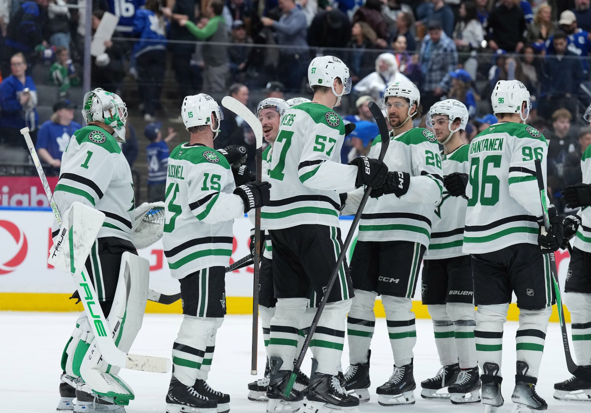 The Dallas Stars players celebrate at Scotiabank Arena.