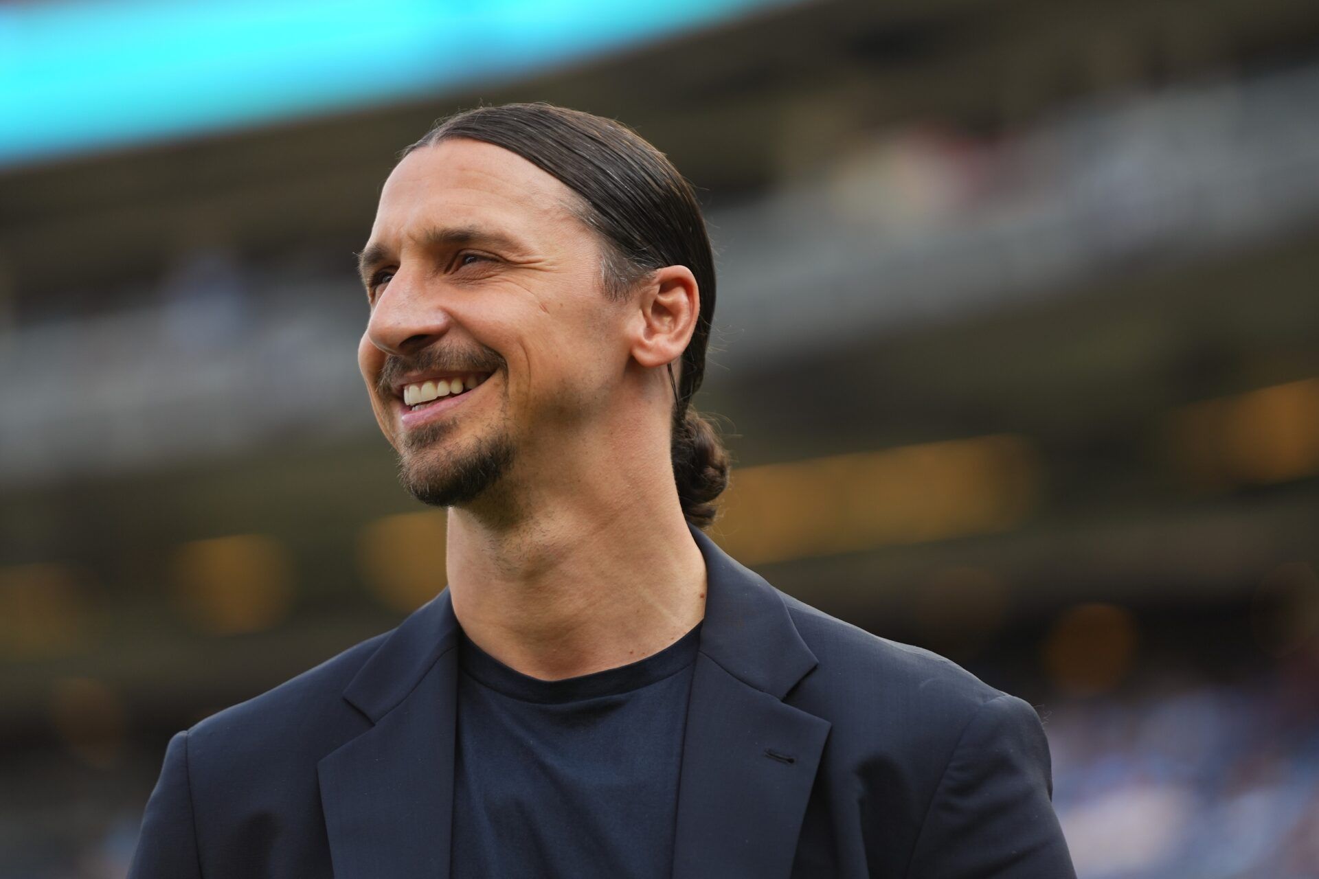 Former player Zlatan Ibrahimovic looks on before the match between AC Milan and Manchester City at Yankee Stadium.