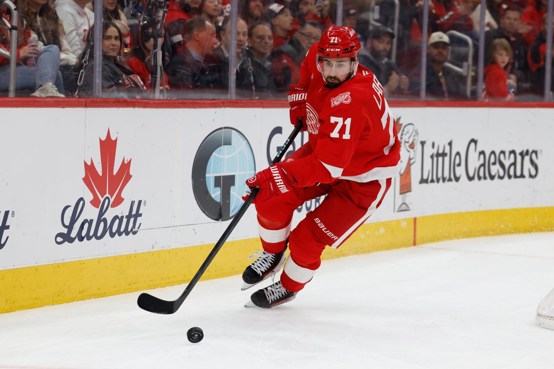 Detroit Red Wings center Dylan Larkin (71) skates with the puck in the first period against the Columbus Blue Jackets at Little Caesars Arena.