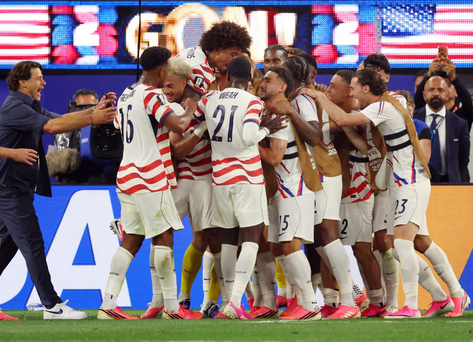 Soccer Football - FIFA World Cup 2026 - Group D - United States v Paraguay - Los Angeles Stadium, Inglewood, California, U.S. - June 12, 2026 Giovanni Reyna of the U.S. celebrates scoring their fourth goal with coach Mauricio Pochettino and teammates IMAGN IMAGES via Reuters/Kiyoshi Mio