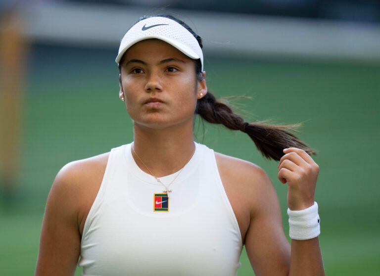 Emma Raducanu of Great Britain during her match against Marketa Vondrousova of the Czech Republic on day three at the All England Lawn Tennis and Croquet Club.