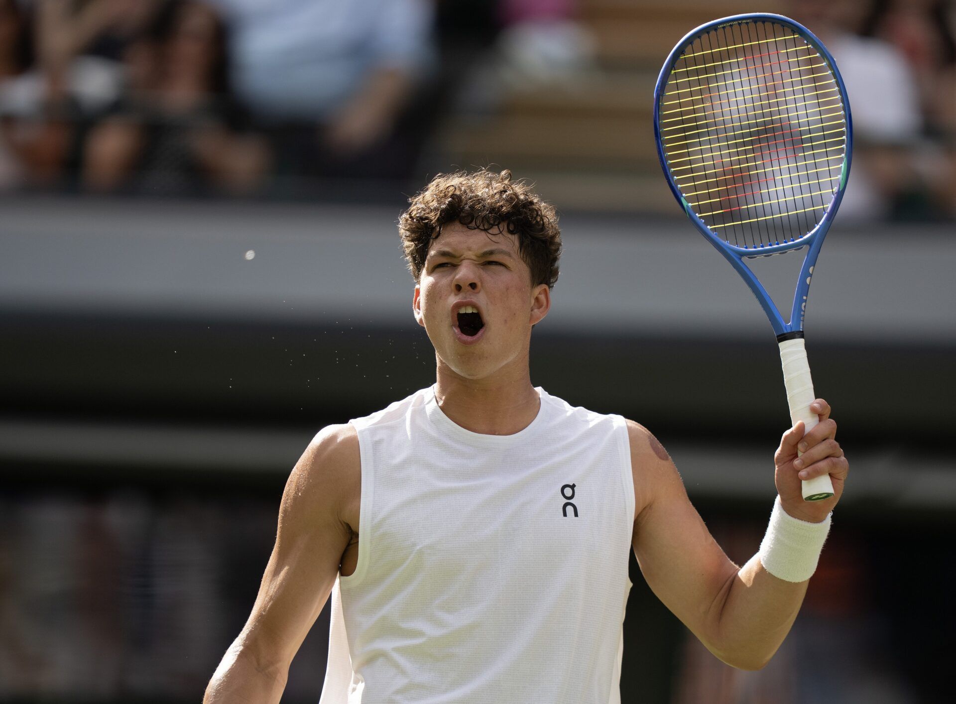 Ben Shelton of the United States reacts to a point during his match against Jannik Sinner of Italy on day 10 at All England Lawn Tennis and Croquet Club.