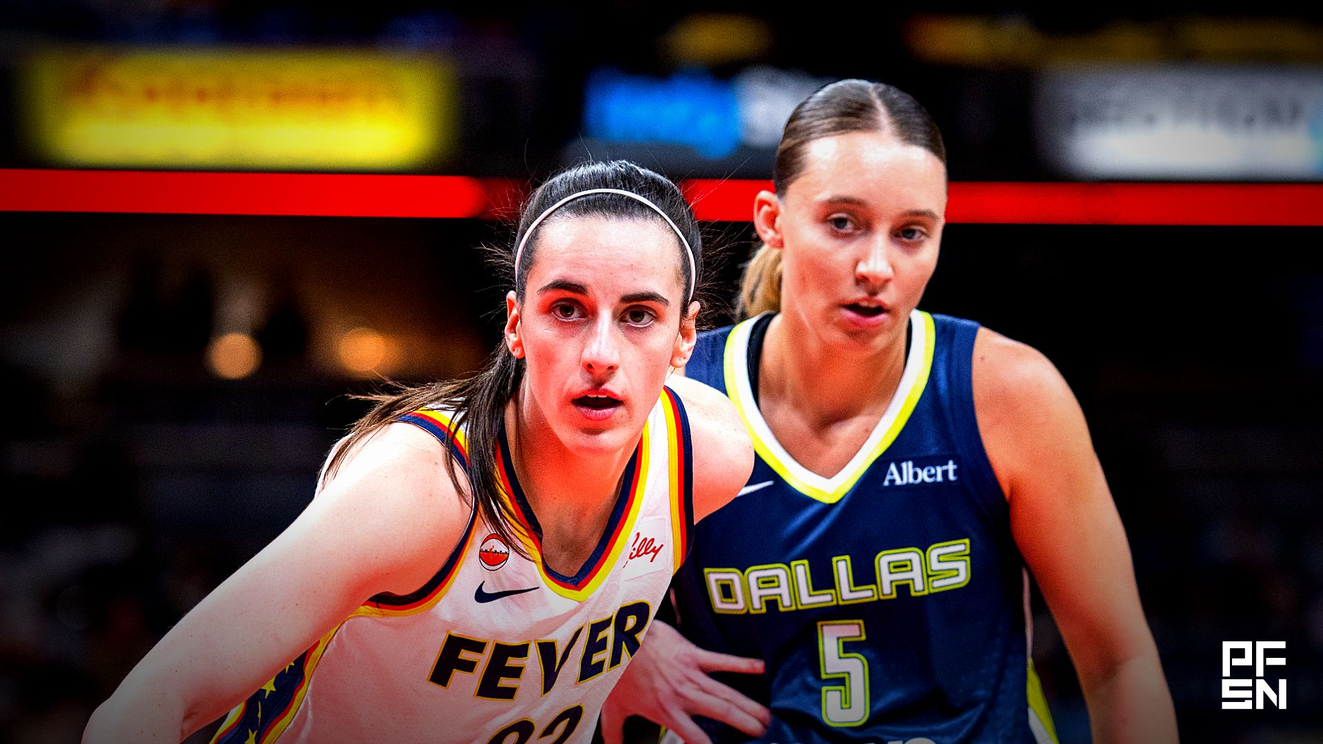 Indiana Fever guard Caitlin Clark (22) and Dallas Wings guard Paige Bueckers (5) during an inbounds play in the first half at the Gainbridge Fieldhouse.