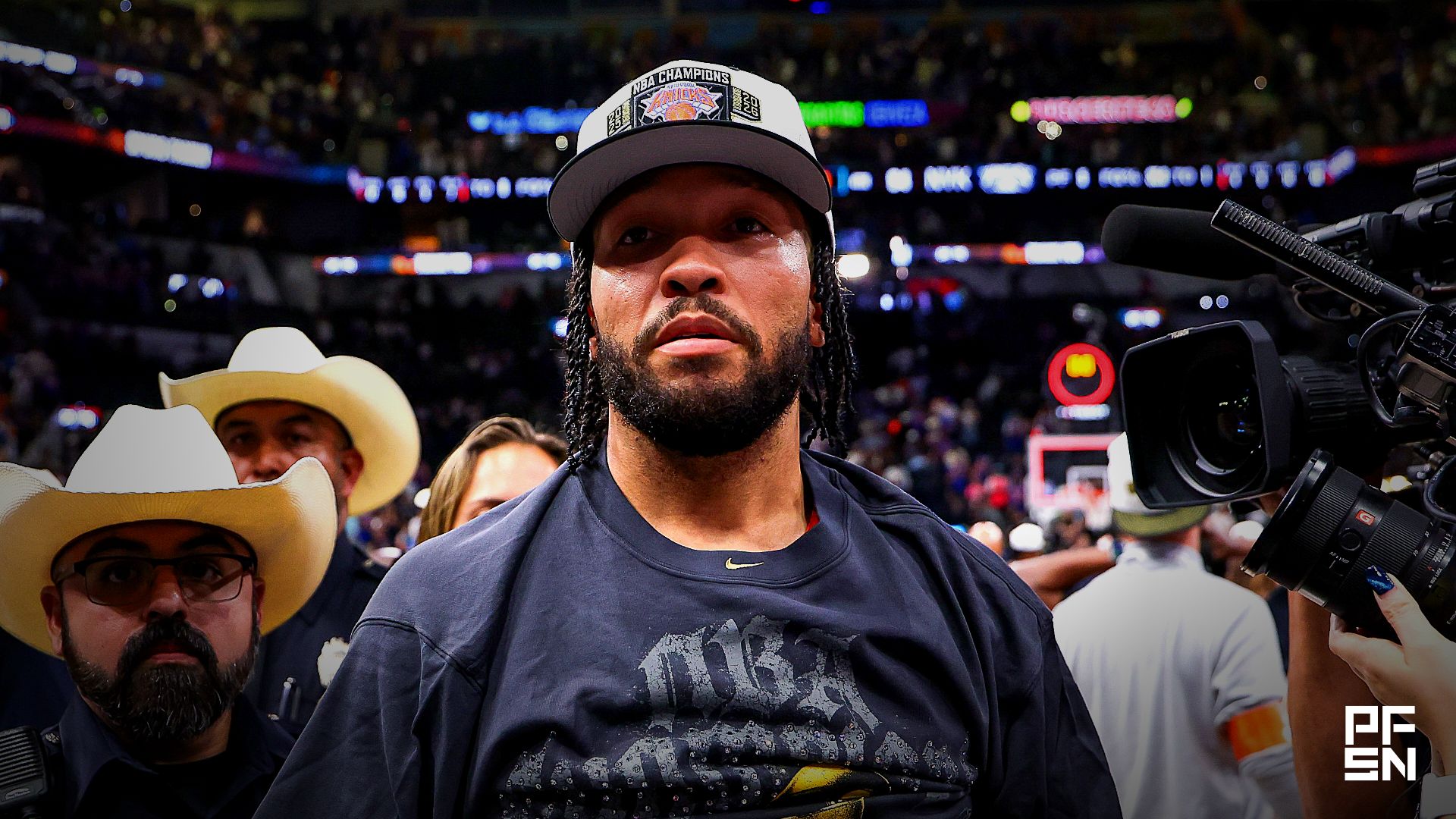 New York Knicks guard Jalen Brunson (11) walks off the court after the Knicks defeat the San Antonio Spurs during game five of the 2026 NBA Finals at Frost Bank Center.