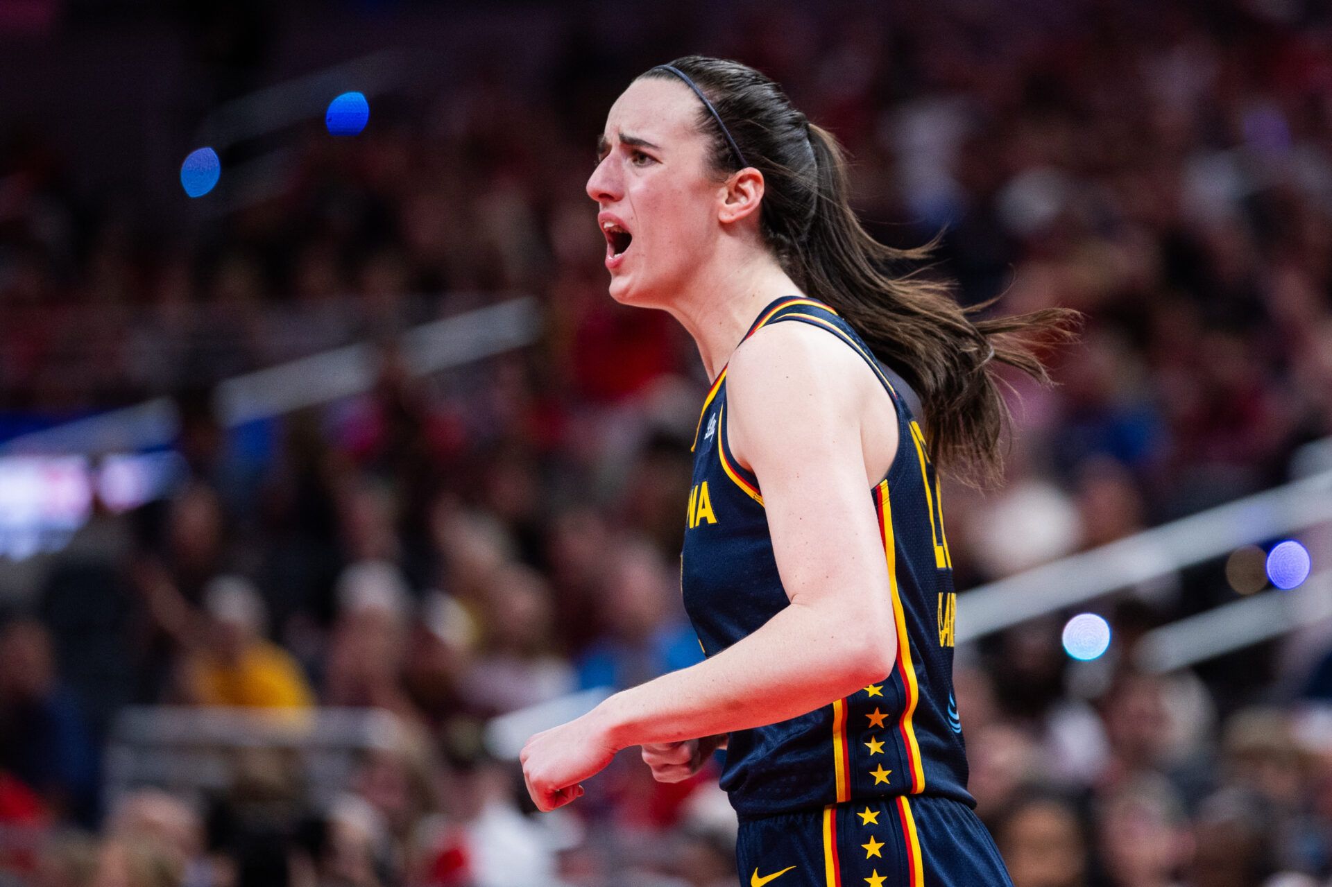 Indiana Fever guard Caitlin Clark (22) reacts to a no call in the second half against the Chicago Sky at Gainbridge Fieldhouse.