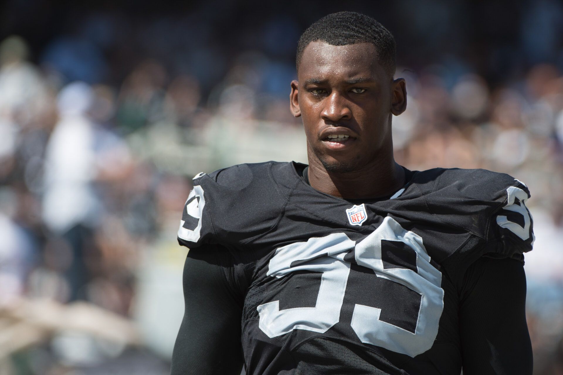 Oakland Raiders defensive end Aldon Smith (99) during the first quarter against the Baltimore Ravens at O.co Coliseum. The Raiders defeated the Ravens 37-33.
