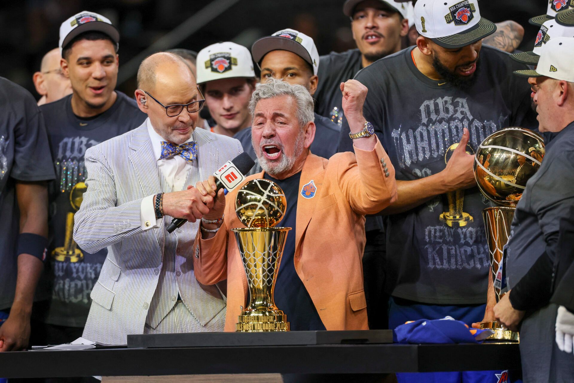 New York Knicks owner James Dolan and the players celebrate after defeating the San Antonio Spurs during game five of the 2026 NBA Finals at Frost Bank Center.