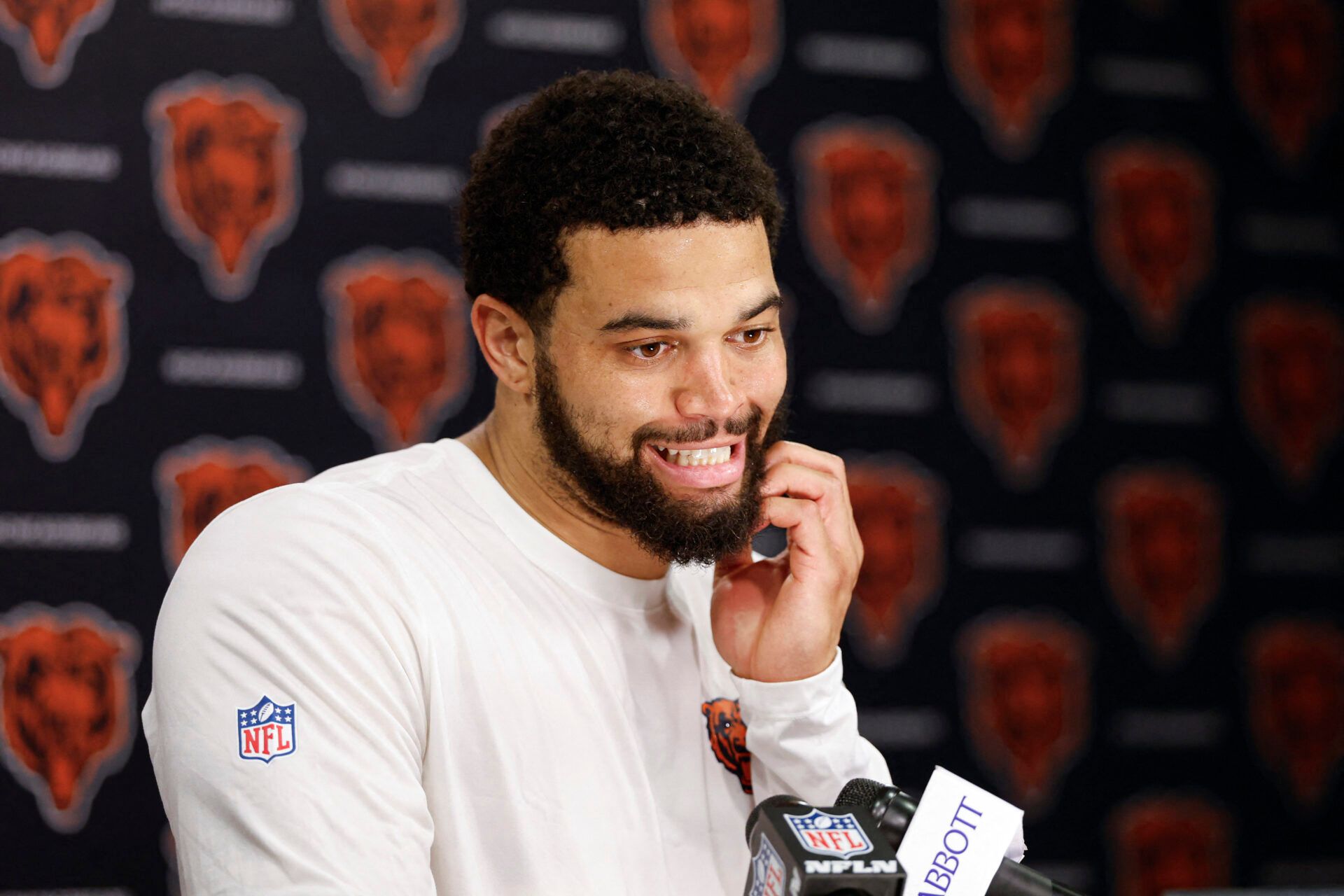 Chicago Bears quarterback Caleb Williams (18) speaks during Minicamp at Halas Hall.