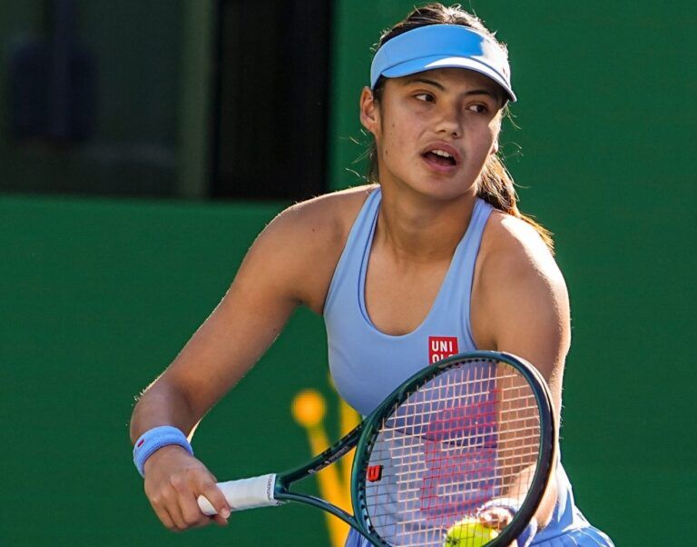 Emma Raducanu gets set to serve to Amanda Anisimova during their third-round match at the BNP Paribas Open in Indian Wells, Calif., Sunday, March 8, 2026.