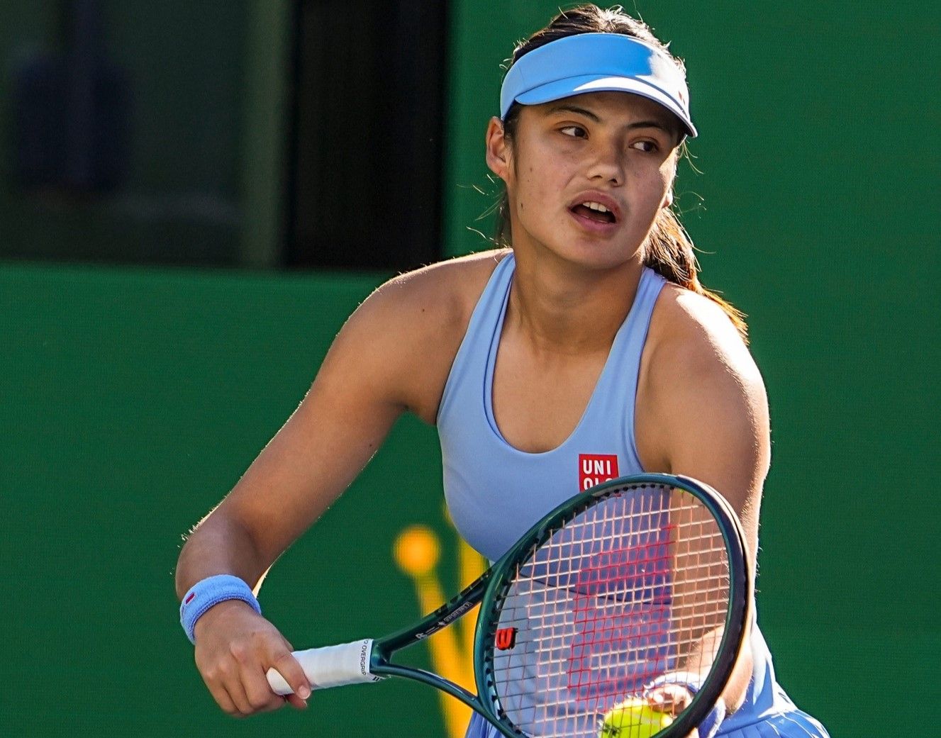 Emma Raducanu gets set to serve to Amanda Anisimova during their third-round match at the BNP Paribas Open in Indian Wells, Calif., Sunday, March 8, 2026.