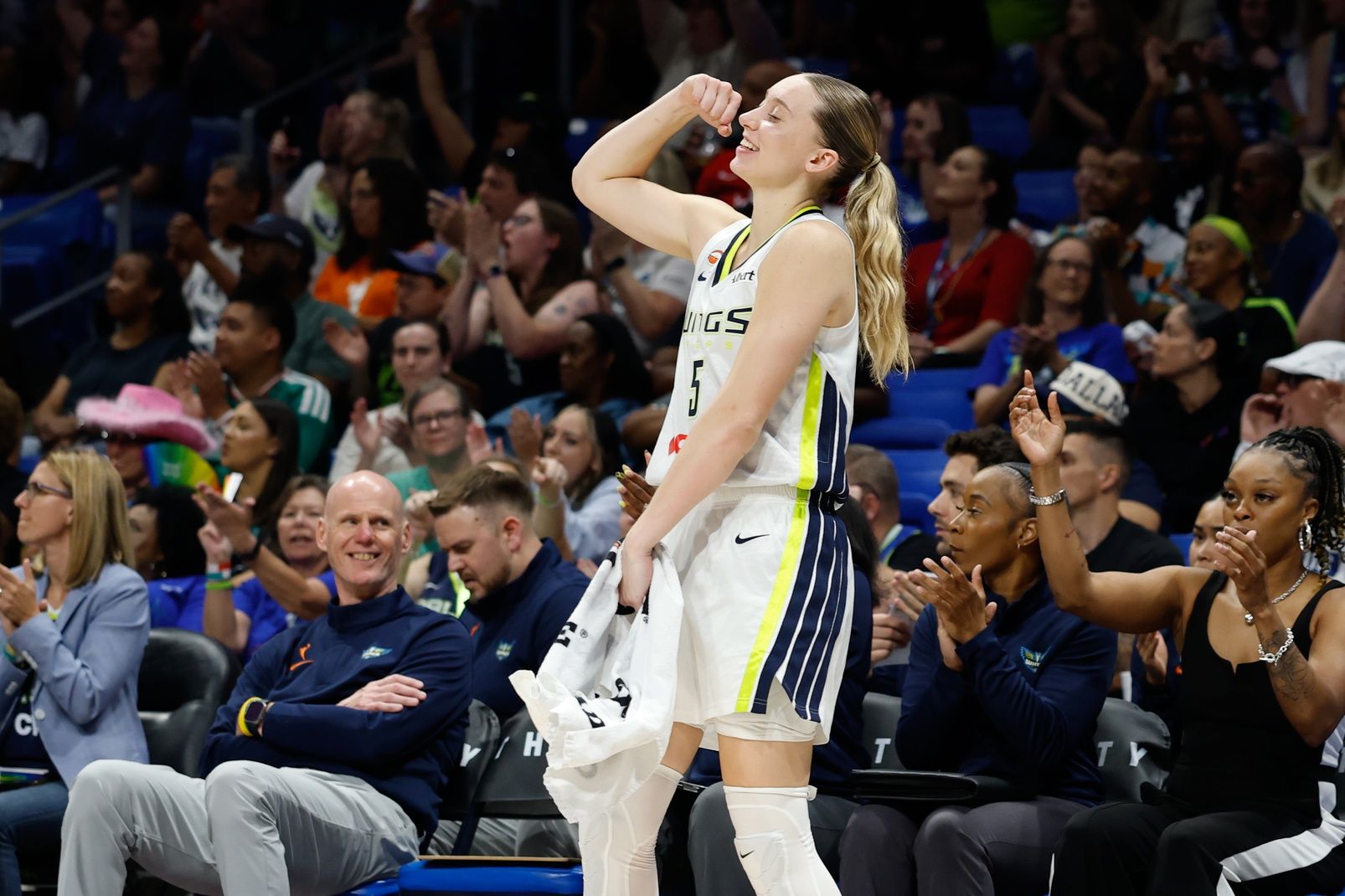 Dallas Wings guard Paige Bueckers (5) celebrates after a play against the Phoenix Mercury during the second half at College Park Center.