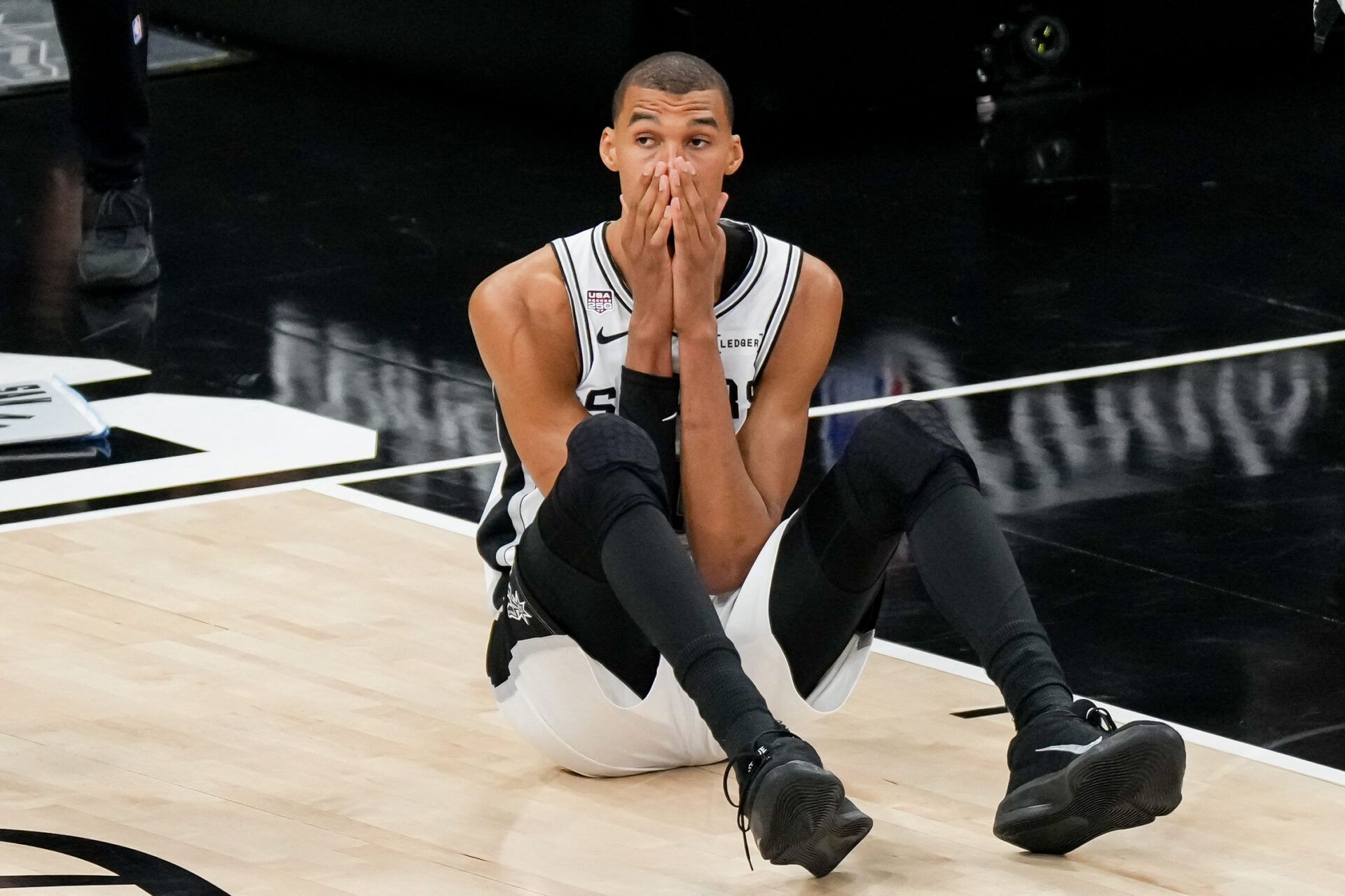 San Antonio Spurs forward Victor Wembanyama (1) reacts after a play against the New York Knicks in the second half during game five of the 2026 NBA Finals at Frost Bank Center.