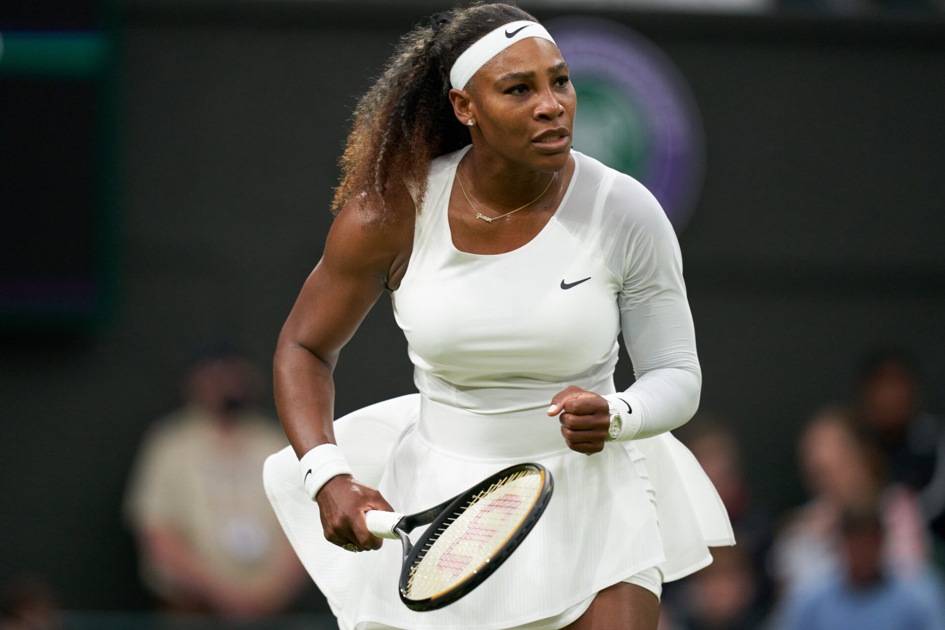 Serena Williams (USA) reacts while playing Aliaksandra Sasnovich (BLR) in first round ladies singles on centre court at All England Lawn Tennis and Croquet Club.