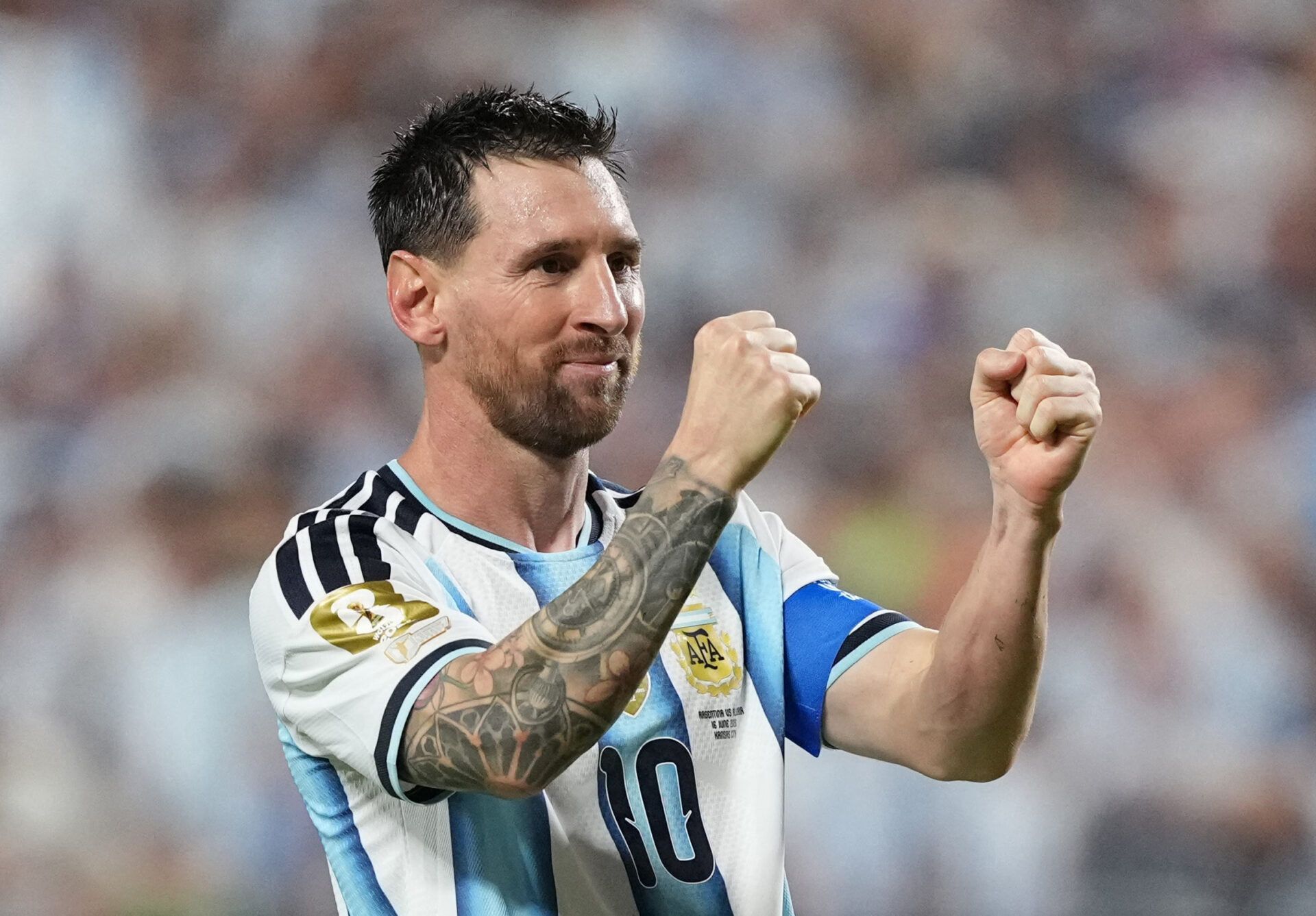 Argentina's Lionel Messi celebrates scoring their third goal to complete a hat-trick.