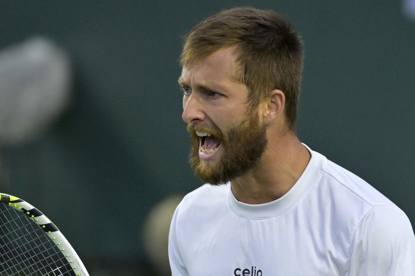 Corentin Moutet (FRA) reacts after winning a point