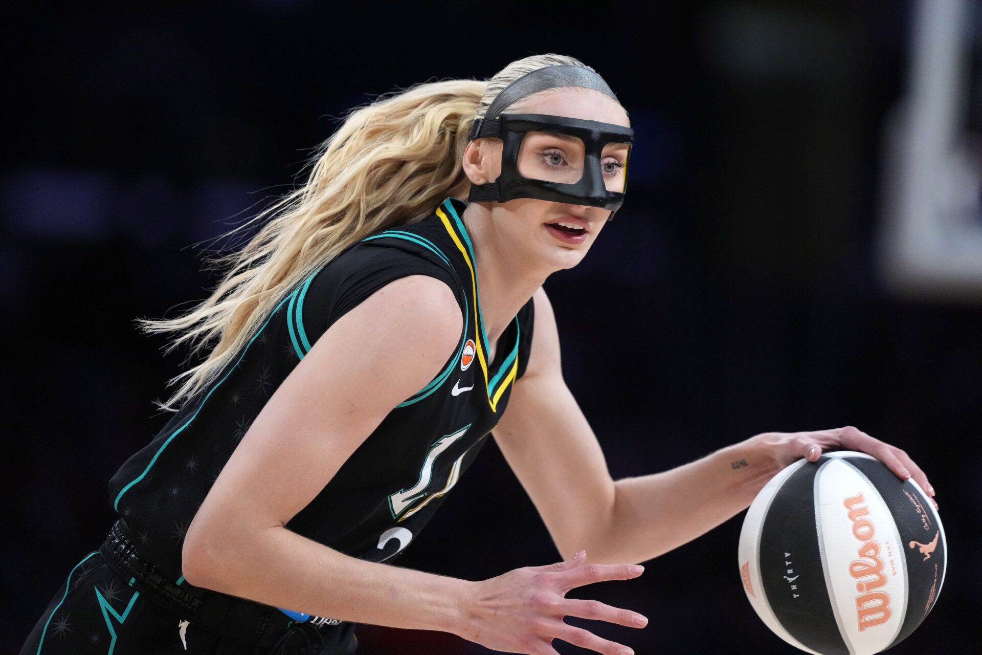 LA Sparks forward Cameron Brink (22) dribbles the ball against the Dallas Wings in the first half at Crypto.com Arena.