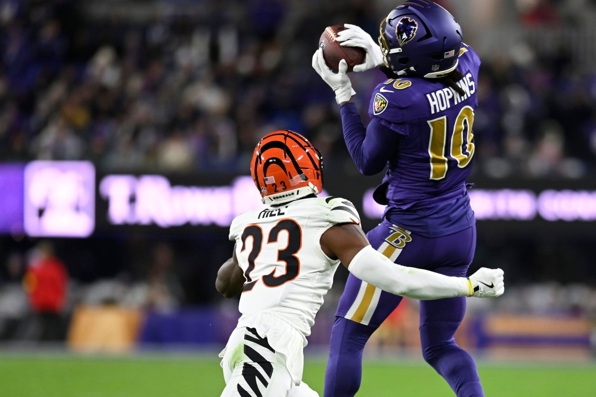 Baltimore Ravens wide receiver DeAndre Hopkins (10) makes a catch against Cincinnati Bengals cornerback Dax Hill (23) during the second half at M&T Bank Stadium.