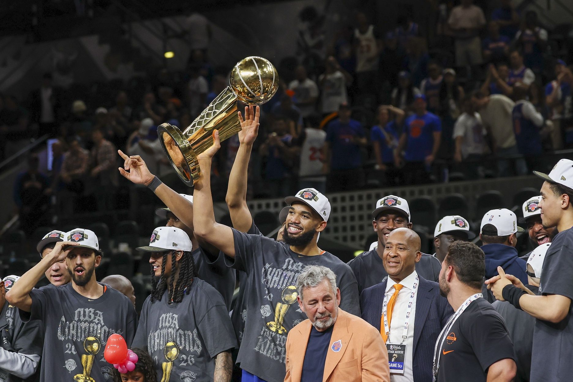 New York Knicks center Karl-Anthony Towns (32) celebrates with his teammates after the Knicks defeat the San Antonio Spurs during game five of the 2026 NBA Finals at Frost Bank Center.
