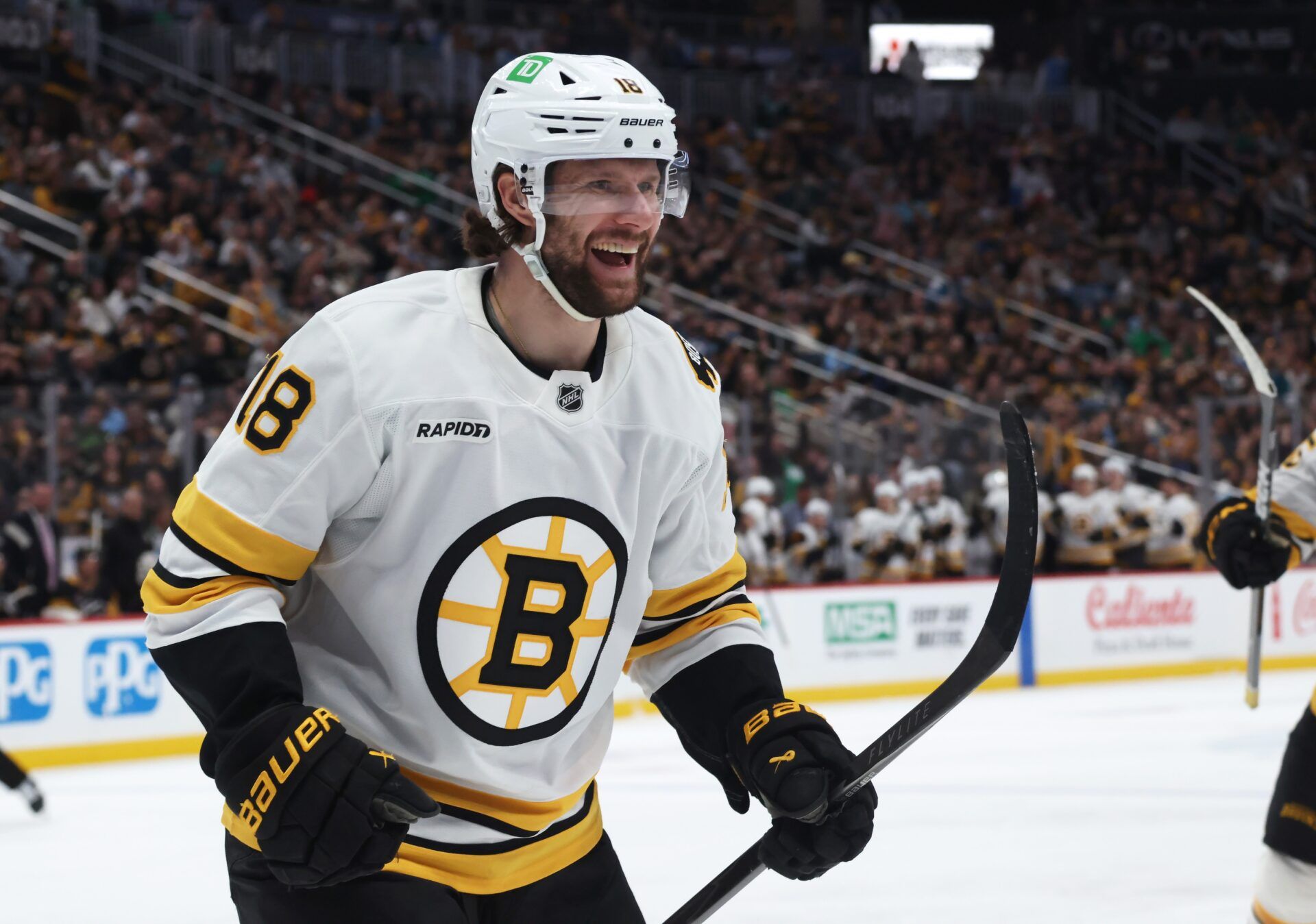 Boston Bruins center Pavel Zacha (18) reacts after scoring his third goal of the game to complete a hat trick against the Pittsburgh Penguins during the third period at PPG Paints Arena.