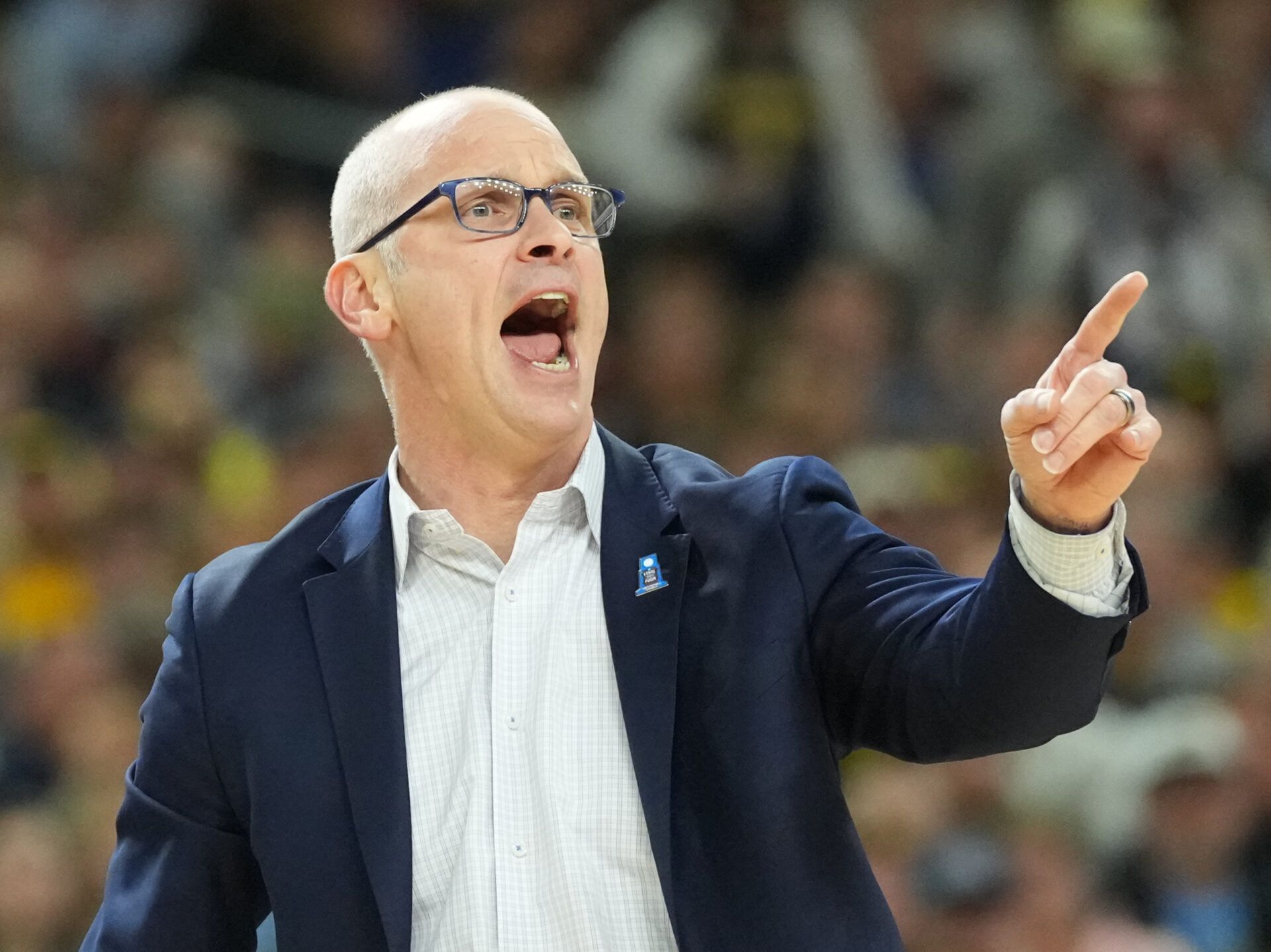 Connecticut Huskies head coach Dan Hurley reacts against the Michigan Wolverines in the first half during the national championship of the Final Four of the men's 2026 NCAA Tournament at Lucas Oil Stadium.
