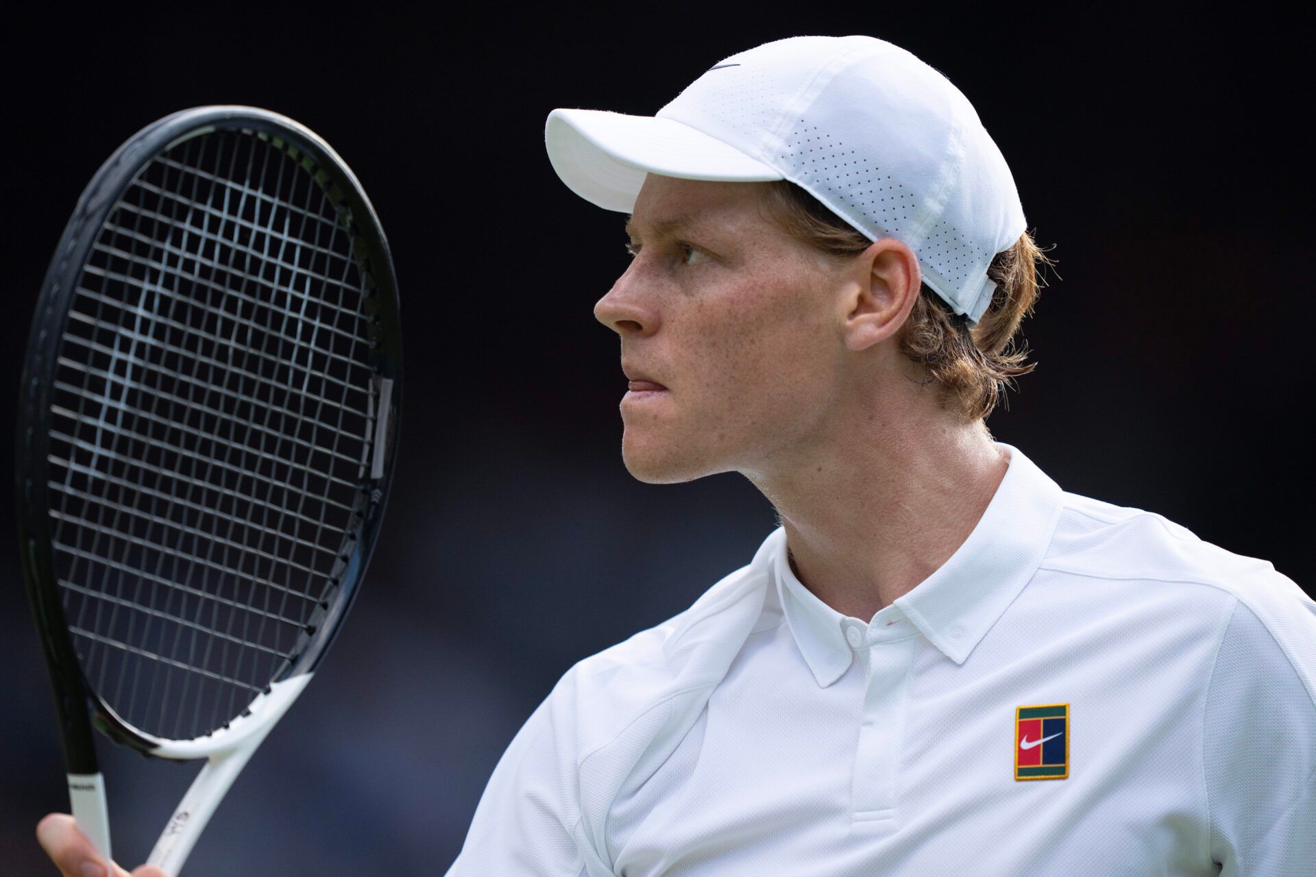 Jannik Sinner of Italy reacts to a point during the menÕs singles final match against Carlos Alcaraz of Spain on day 14 at All England Lawn Tennis and Croquet Club.