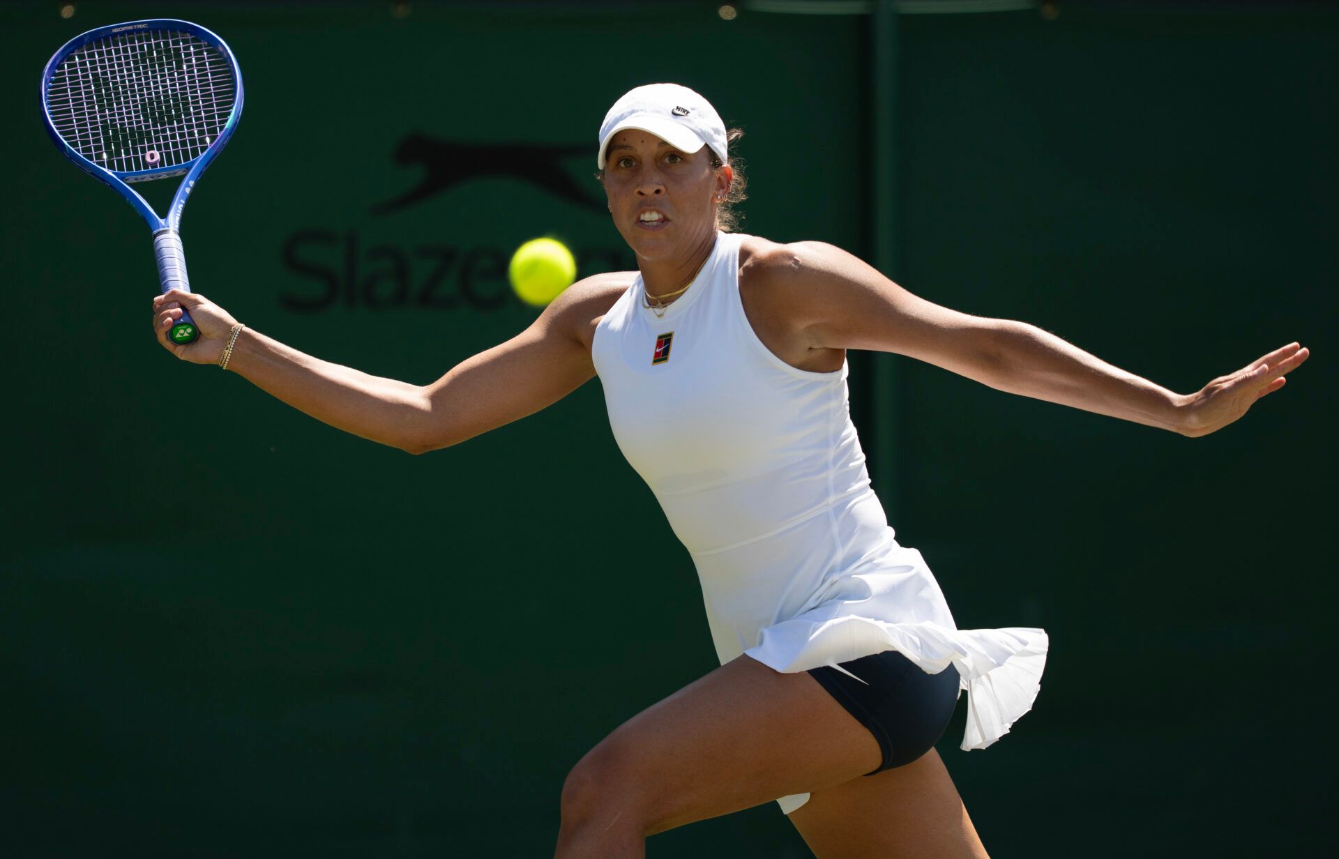 Madison Keys of the United States returns a shot during her match against Laura Siegemund of Germany on day five at the All England Lawn Tennis and Croquet Club.
