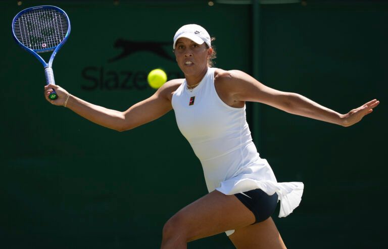 Madison Keys of the United States returns a shot during her match against Laura Siegemund of Germany on day five at the All England Lawn Tennis and Croquet Club.