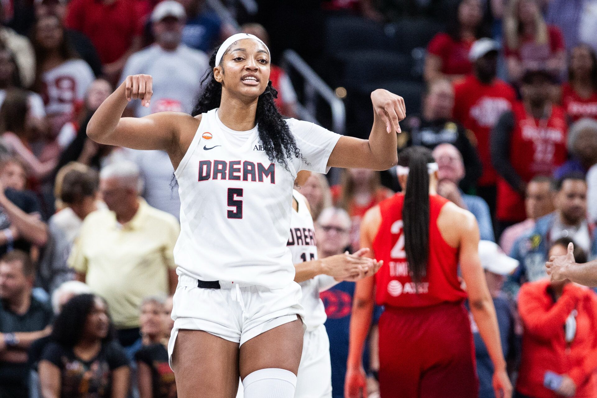 Atlanta Dream forward Angel Reese (5) celebrates a basket in the second half against the Indiana Fever at Gainbridge Fieldhouse.