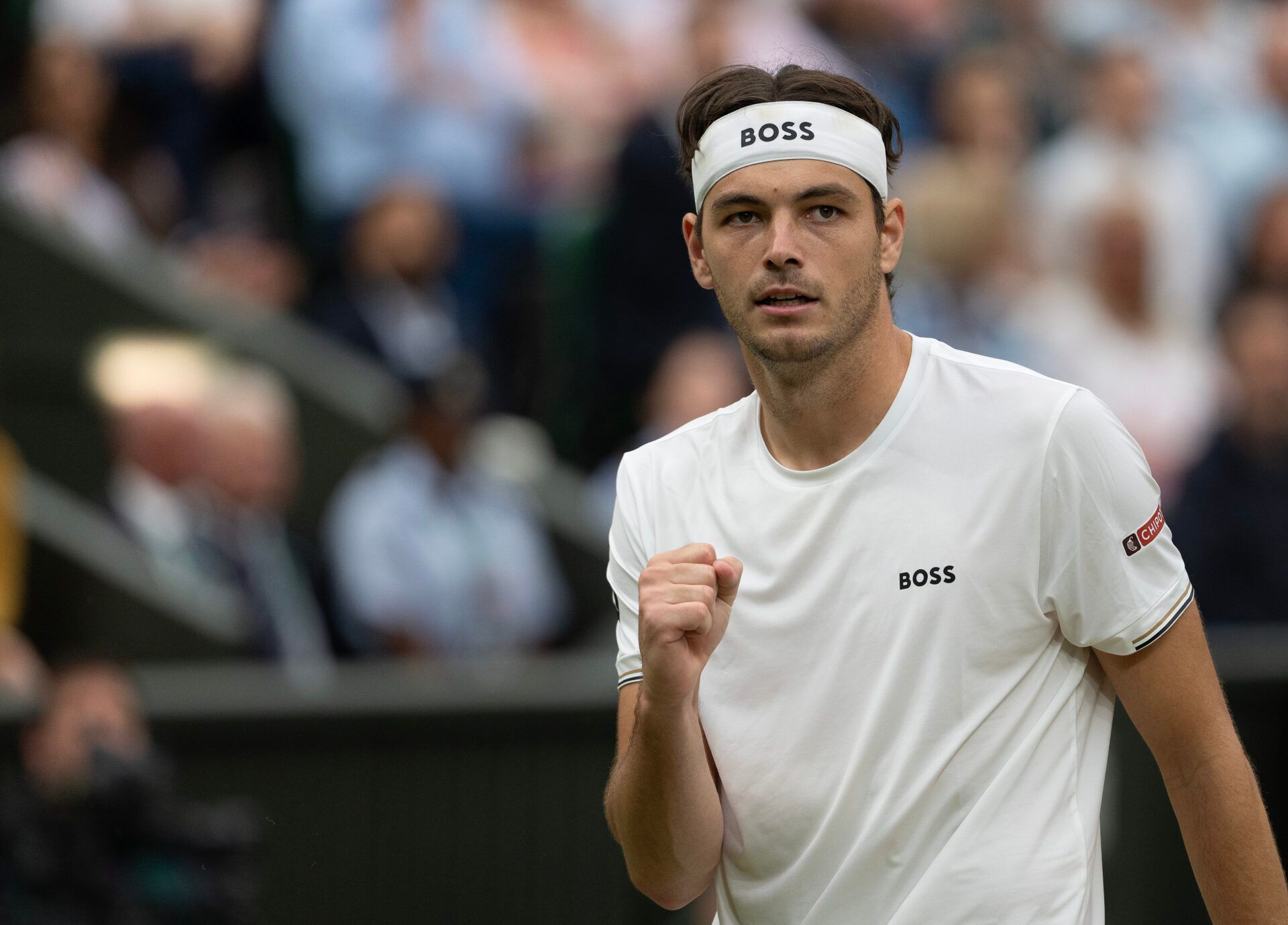 Taylor Fritz of the United States reacts to a point during his match against Alexander Zverev of Germany (not shown) on day eight of The Championships at All England Lawn Tennis and Croquet Club.