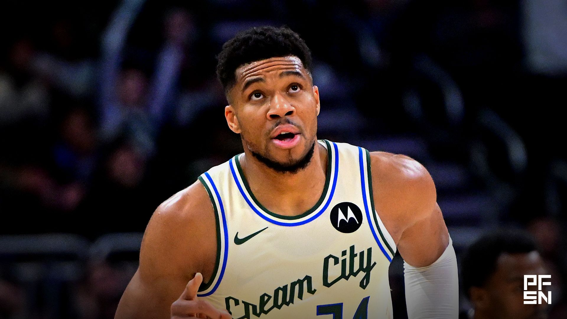Milwaukee Bucks forward Giannis Antetokounmpo (34) reacts after scoring his 21,000th career point in the third quarter against the Brooklyn Nets at Fiserv Forum.