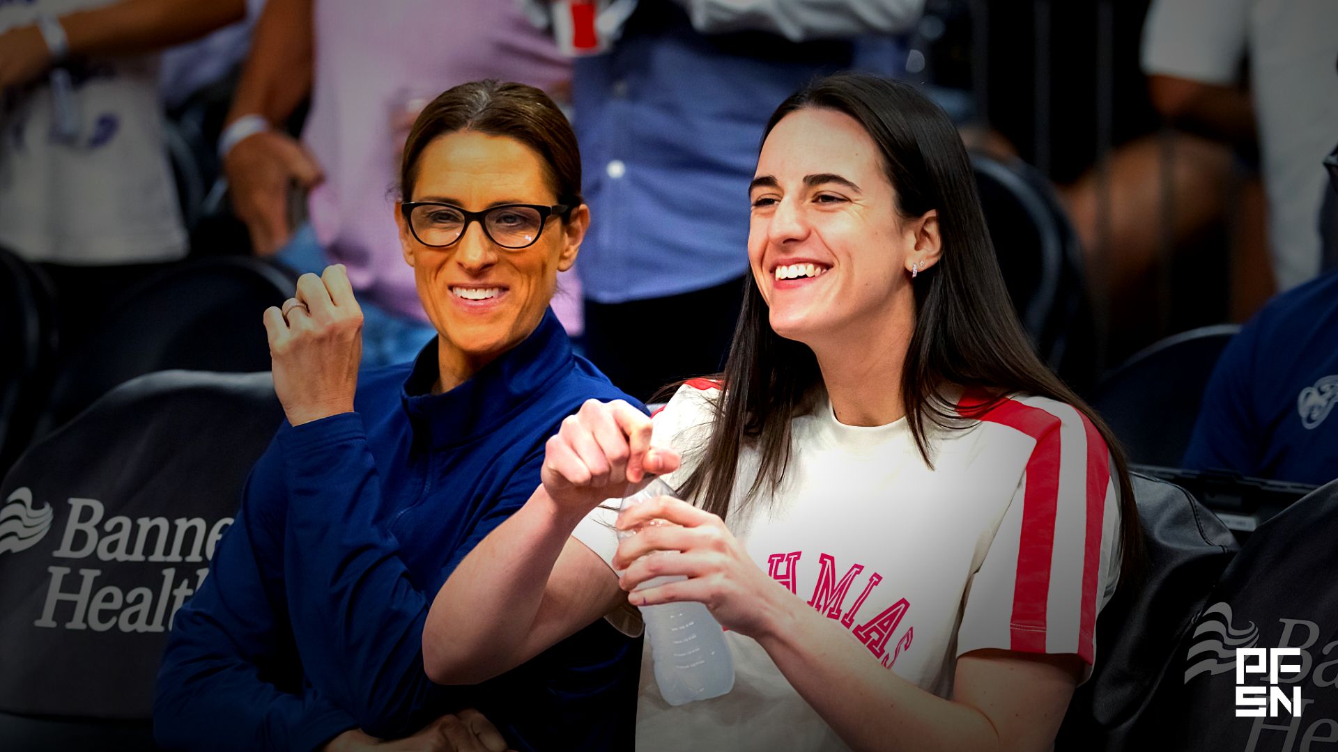 Indiana Fever injured guard Caitlin Clark (right) with head coach Stephanie White against the Phoenix Mercury during an WNBA game at PHX Arena.