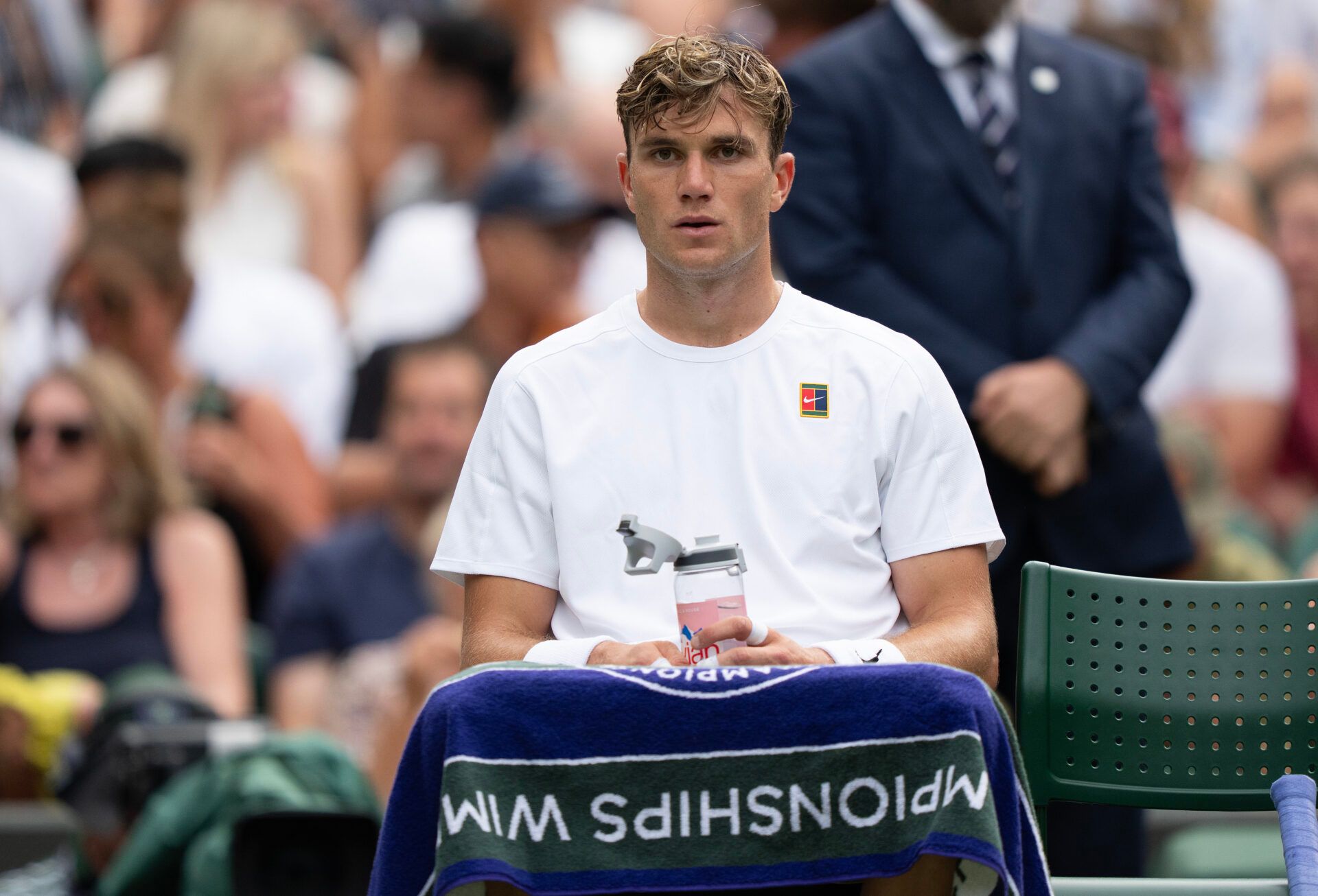 Jack Draper of Great Britain at a change of ends during his match against Marin Cilic of Croatia on day four at the All England Lawn Tennis and Croquet Club.