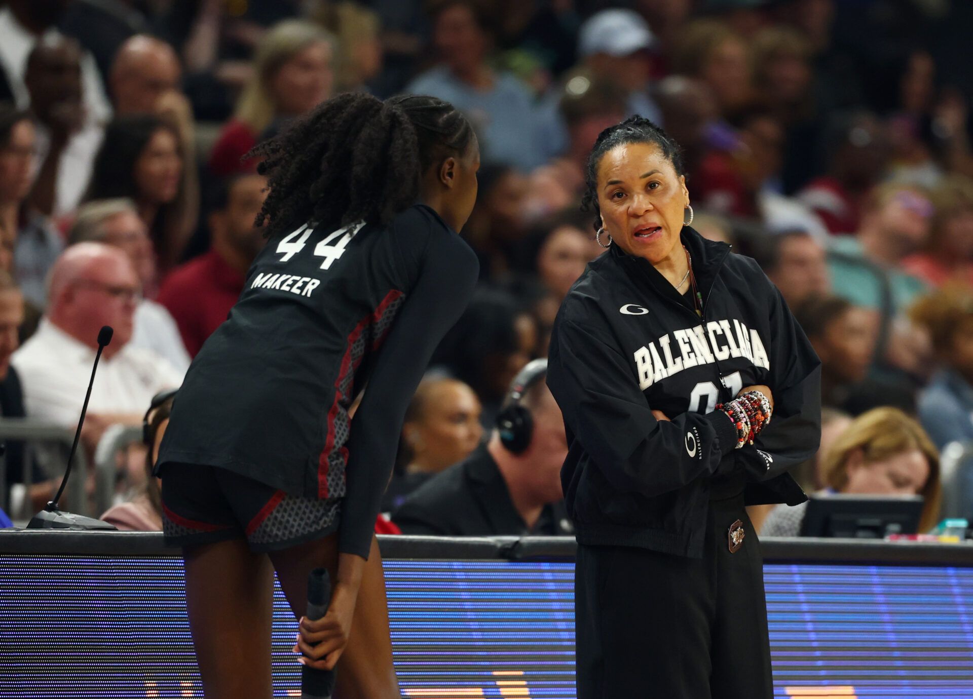 South Carolina Gamecocks head coach Dawn Staley with guard Agot Makeer (44) against the UCLA Bruins during the National Championship game of the women's 2026 NCAA Tournament at Mortgage Matchup Center.