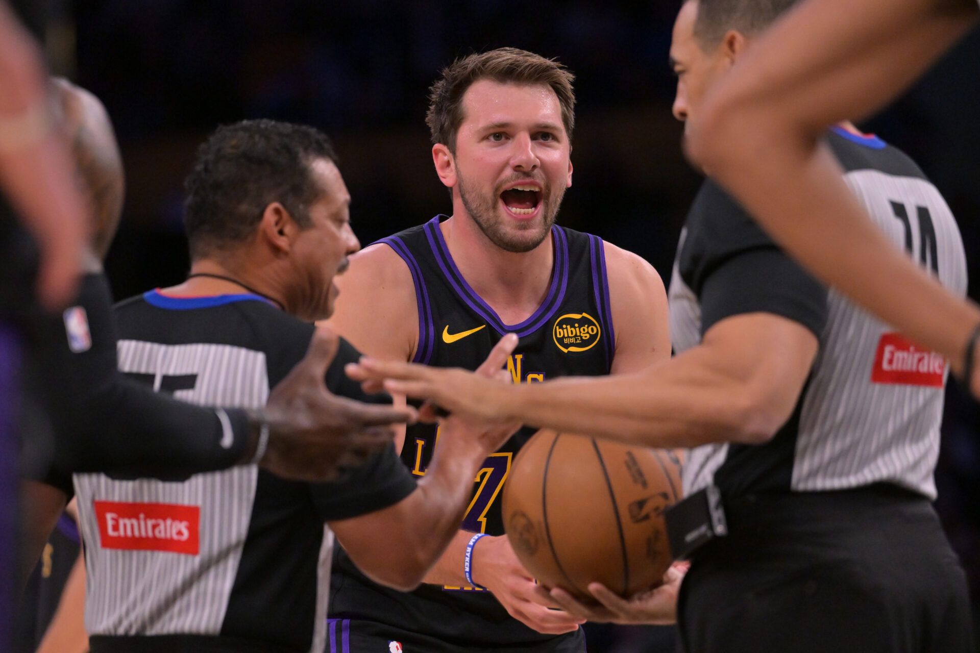 Los Angeles Lakers guard Luka Doncic (77) argues a foul call in the first half against the Cleveland Cavaliers at Crypto.com Arena.