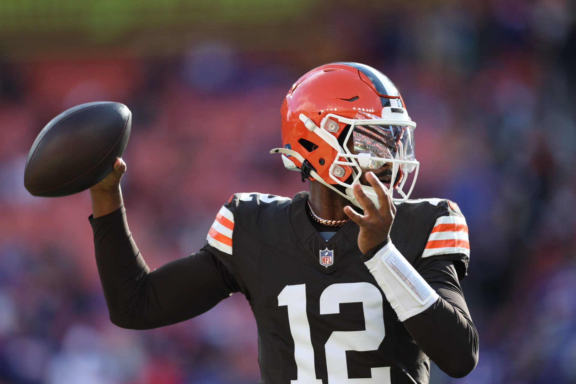 Cleveland Browns quarterback Shedeur Sanders (12) warms up prior to a game against the Buffalo Bills at Huntington Bank Field.