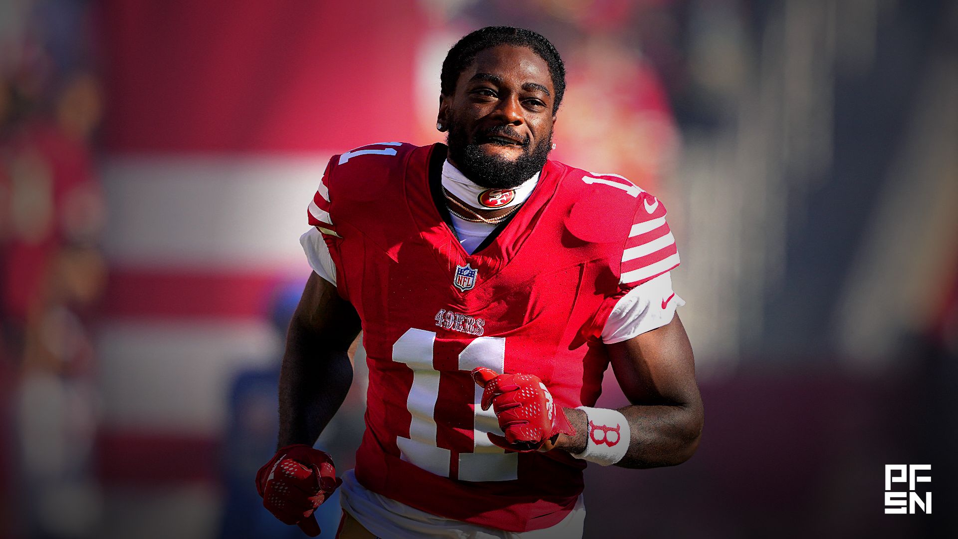 San Francisco 49ers wide receiver Brandon Aiyuk (11) is introduced to the crowd before the game against the New York Jets at Levi's Stadium.