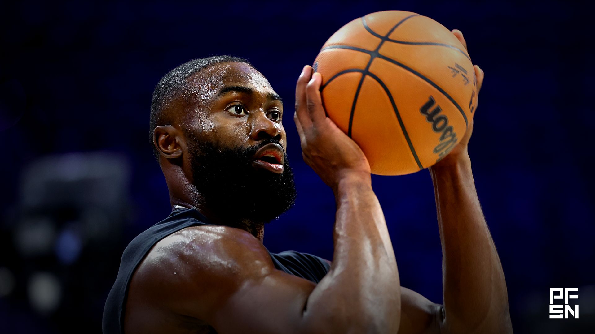 Boston Celtics guard Jaylen Brown warms up before a game against the Philadelphia 76ers at Xfinity Mobile Arena.