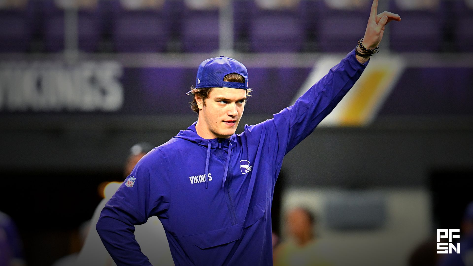 Minnesota Vikings quarterback J.J. McCarthy (9) warms up prior to the game against the Green Bay Packers at U.S. Bank Stadium.