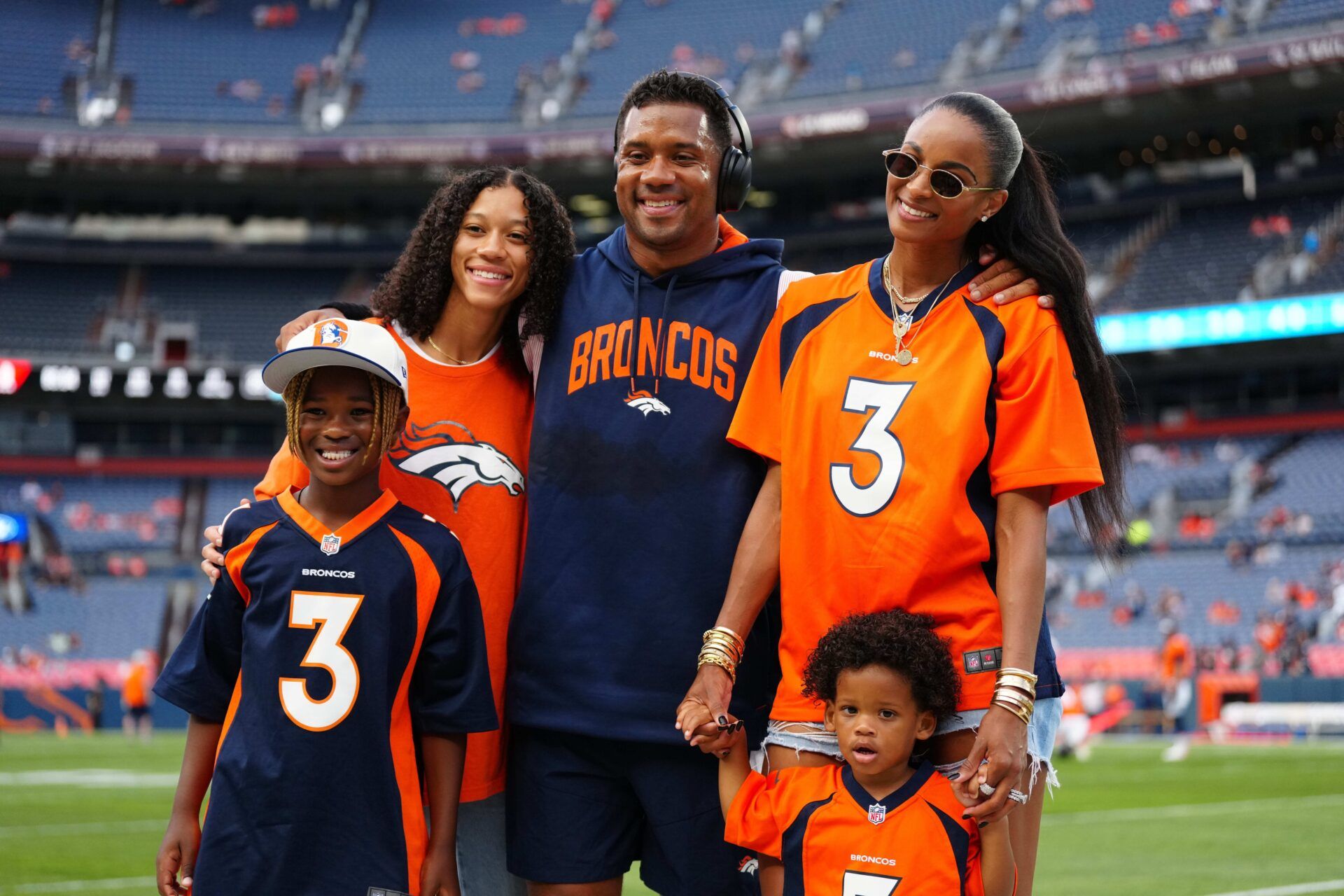 Denver Broncos quarterback Russell Wilson (3) and wife Ciara Wilson and sister Anna Wilson and son Future Wilson and son Win Wilson react before a preseason game against the Dallas Cowboys at Empower Field at Mile High.