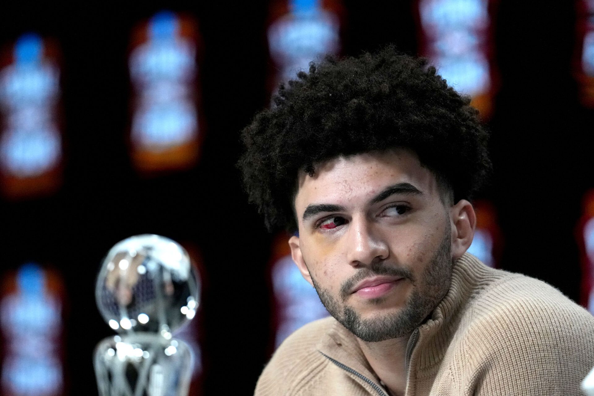 Duke Blue Devils forward Cameron Boozer is awarded the Oscar Robertson Player of the Year Award presented by the US Basketball Writers Association and the Associated Press during the men's 2026 NCAA Tournament at Lucas Oil Stadium.