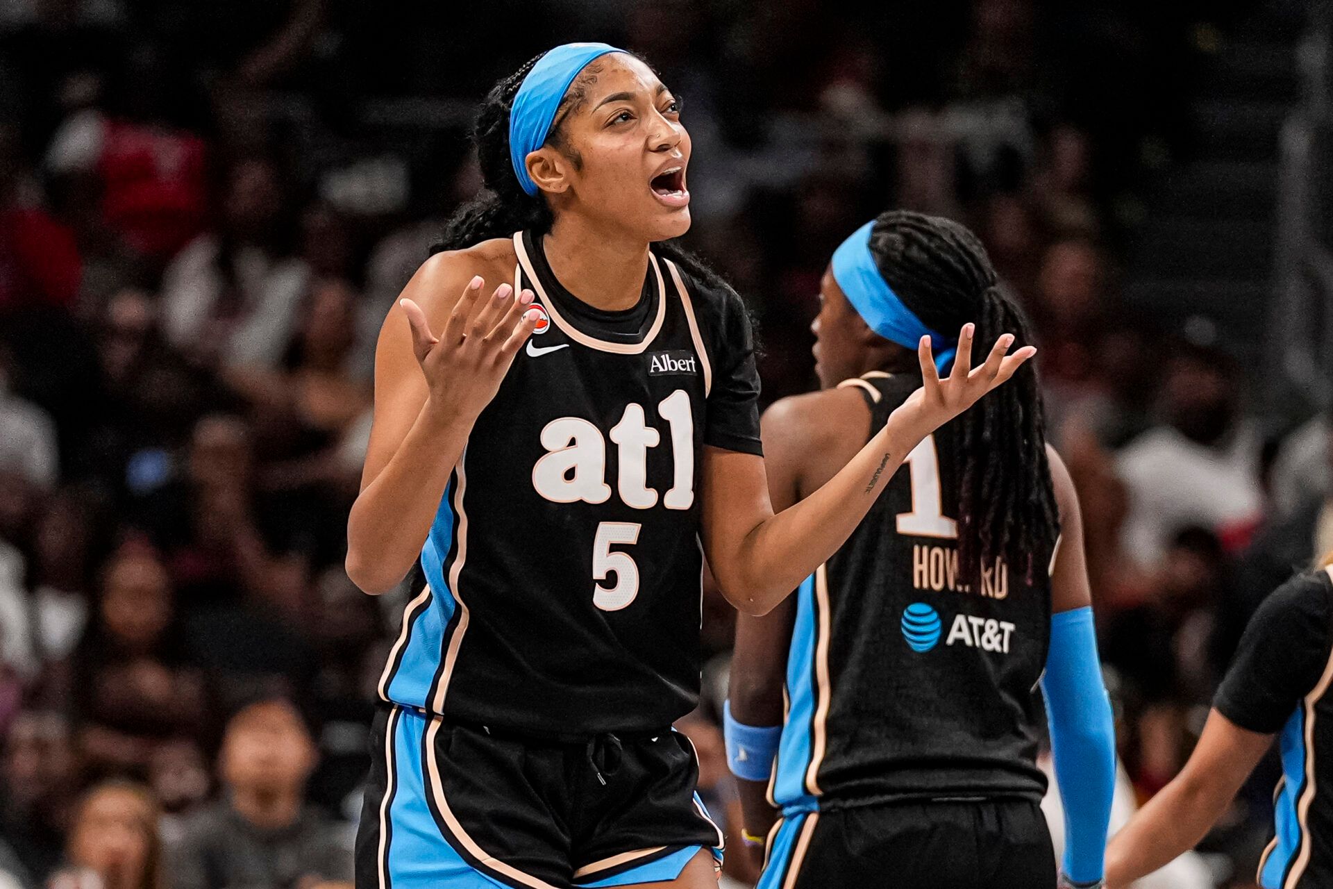 Atlanta Dream forward Angel Reese (5) reacts after a play against the Toronto Tempo during the second half at State Farm Arena.